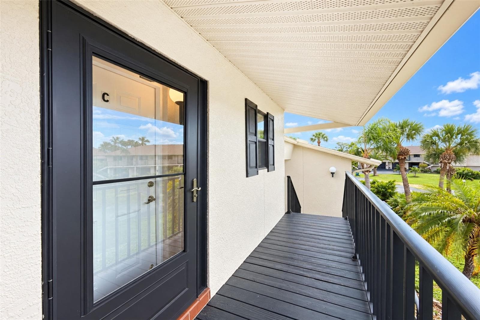 Front entry plus front common balcony - 4260 PLACIDA RD #9C, ENGLEWOOD