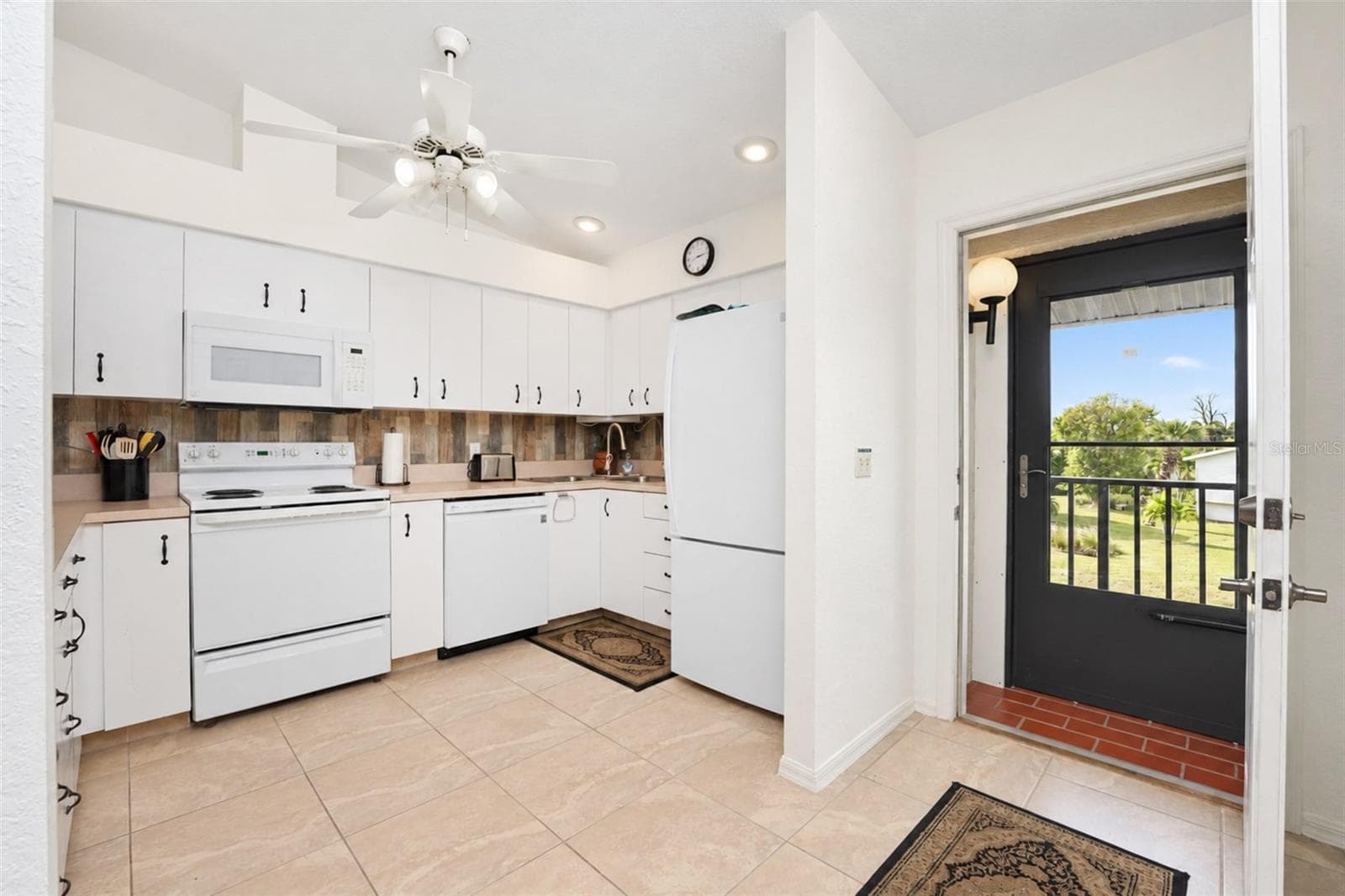 The kitchen is conveniently located upon entry. - 4260 PLACIDA RD #9C, ENGLEWOOD