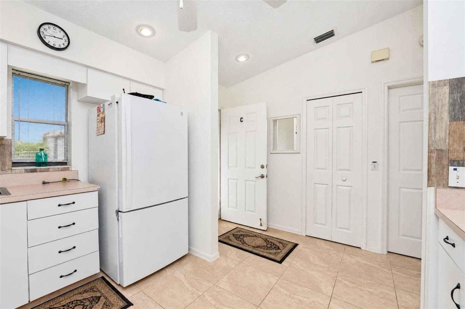 The closet pantry provides additional storage. - 4260 PLACIDA RD #9C, ENGLEWOOD