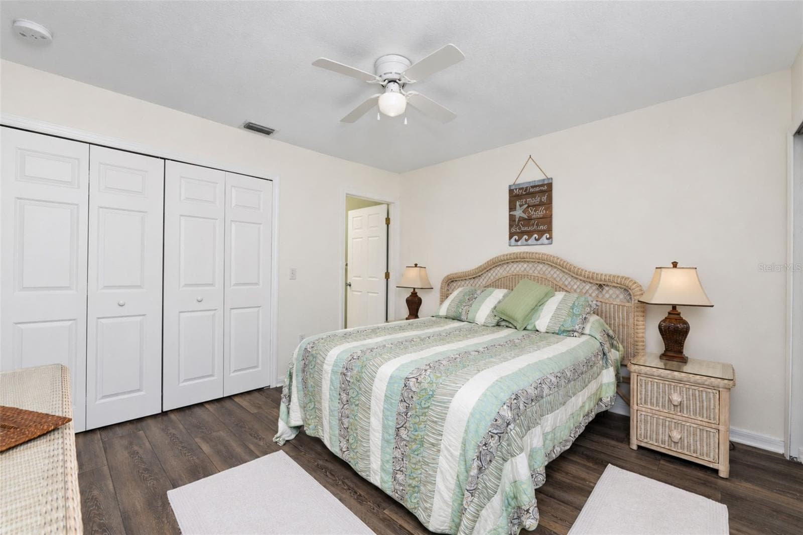 Another view of the primary bedroom, the additional wall closet and entrance to the ensuite bathroom. - 4260 PLACIDA RD #9C, ENGLEWOOD