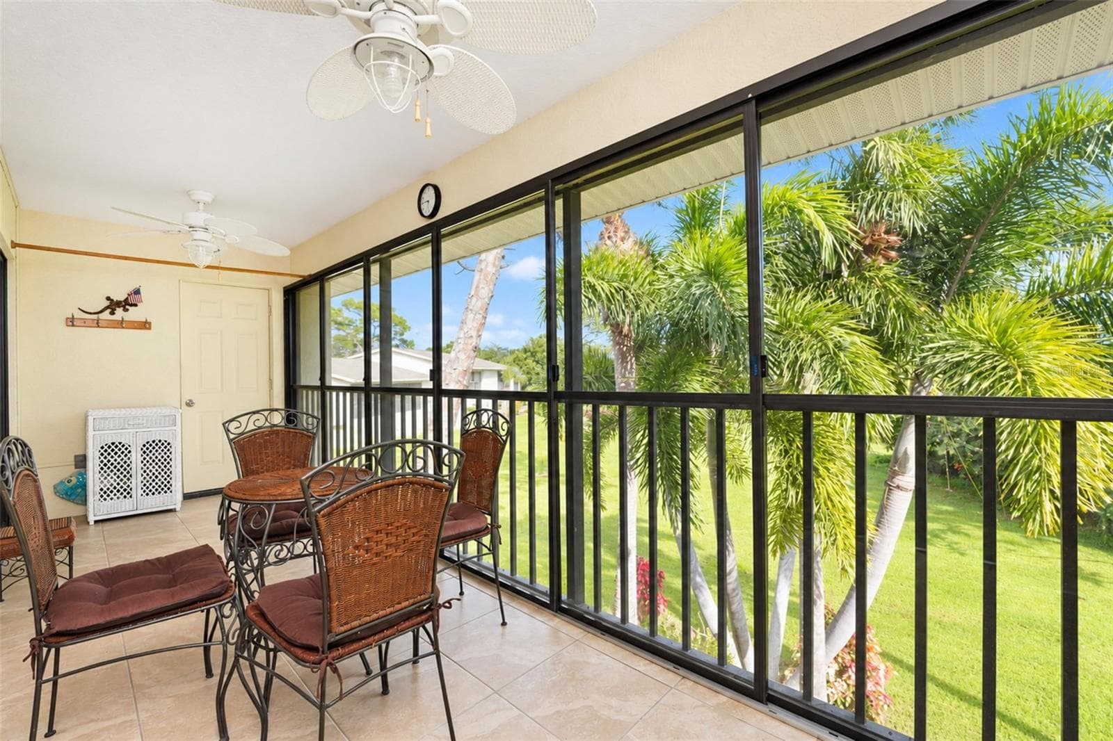 The laundry closet is equipped with a stackable washer & dryer and conveniently located off the lanai. - 4260 PLACIDA RD #9C, ENGLEWOOD