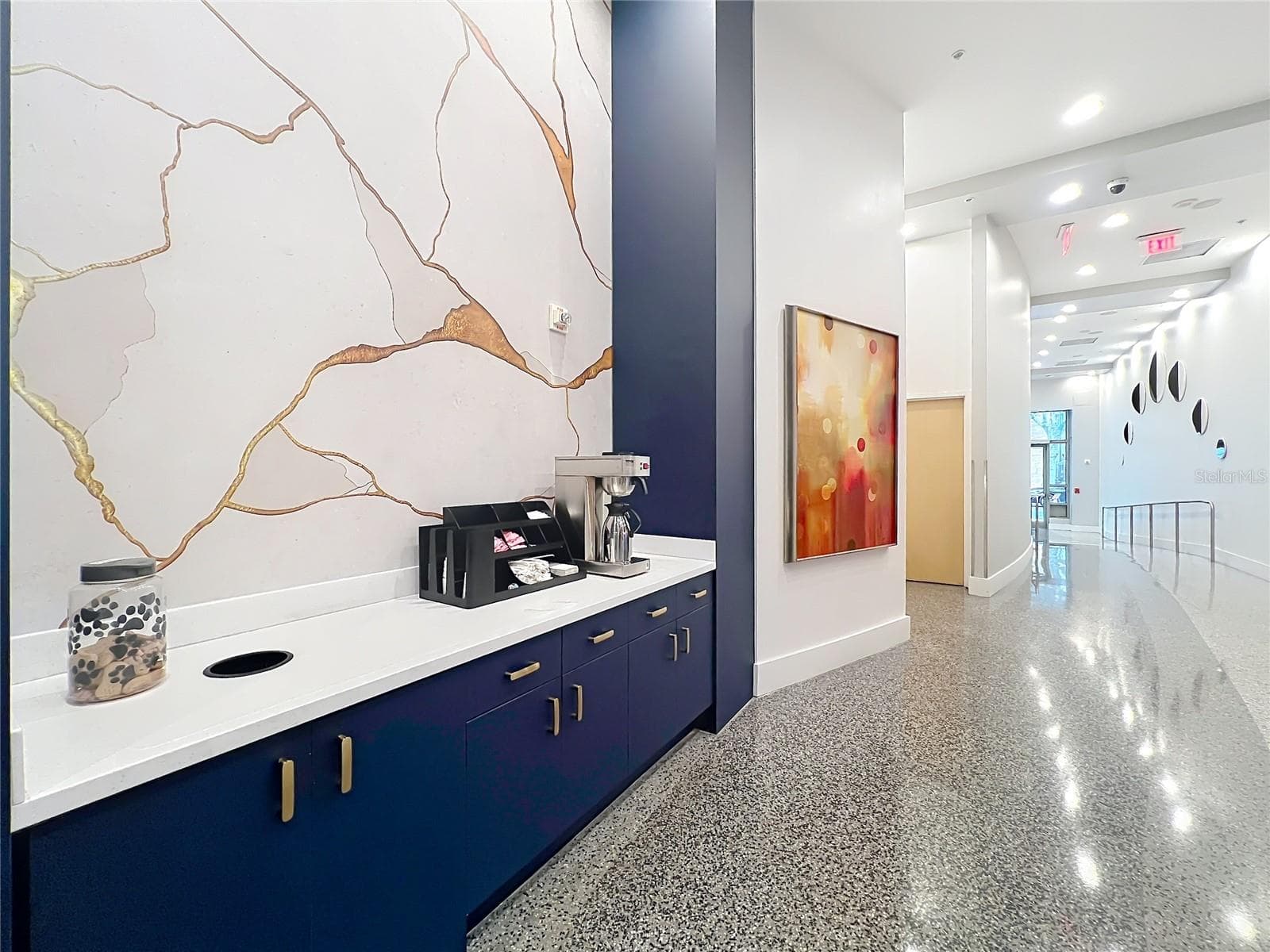 coffee area by Concierge desk. - 155 S COURT AVE #2107, ORLANDO