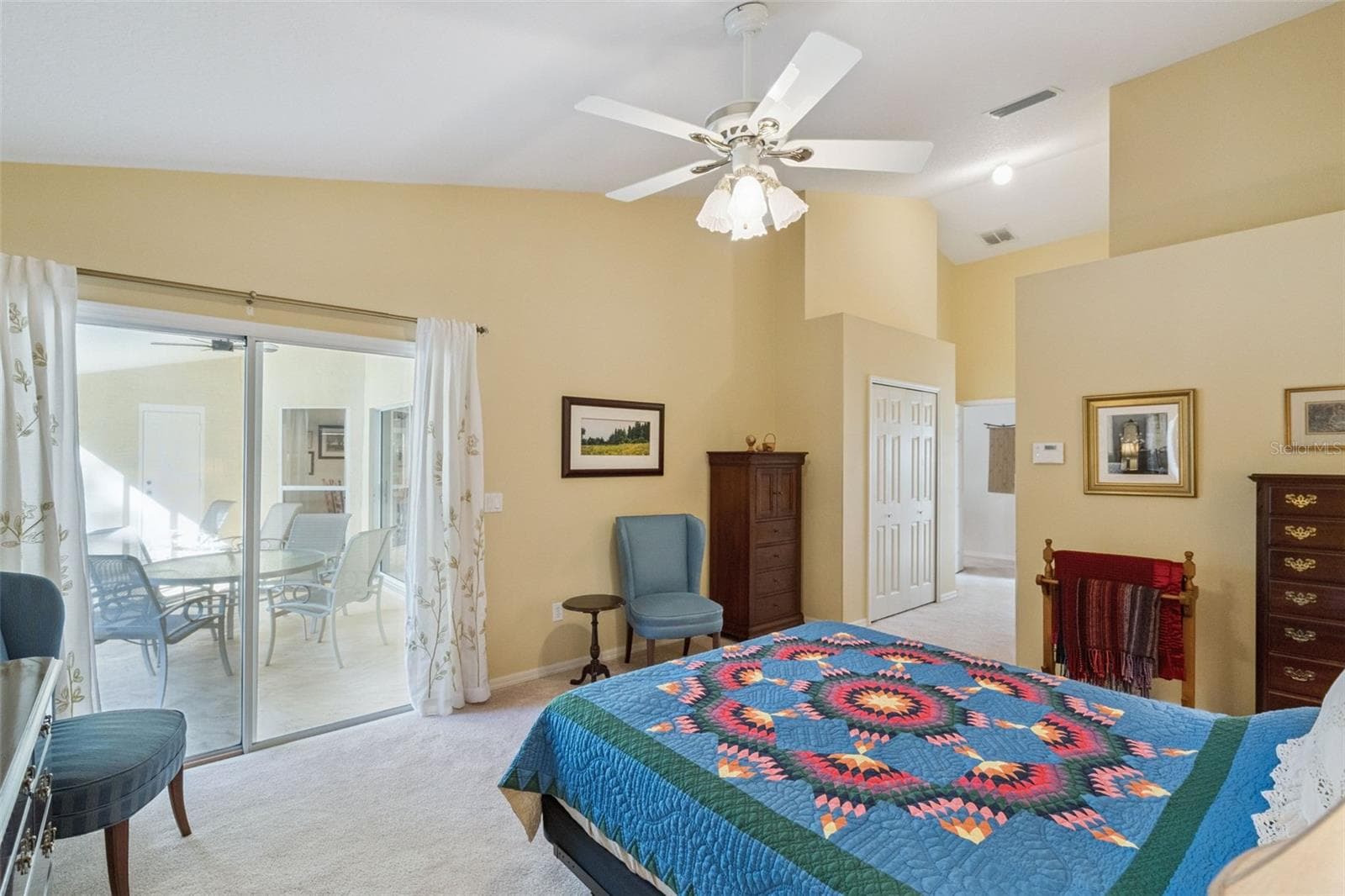 Access to the screened in Porch - 13624 BLUEWATER CIR, ORLANDO