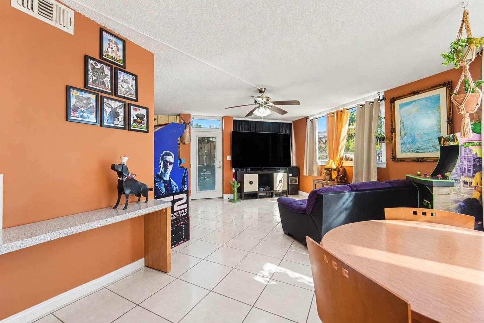 Game Room & Living Area with Orange Walls, Built-in Features & Bar - 1055 ENCOURTE GREEN, APOPKA