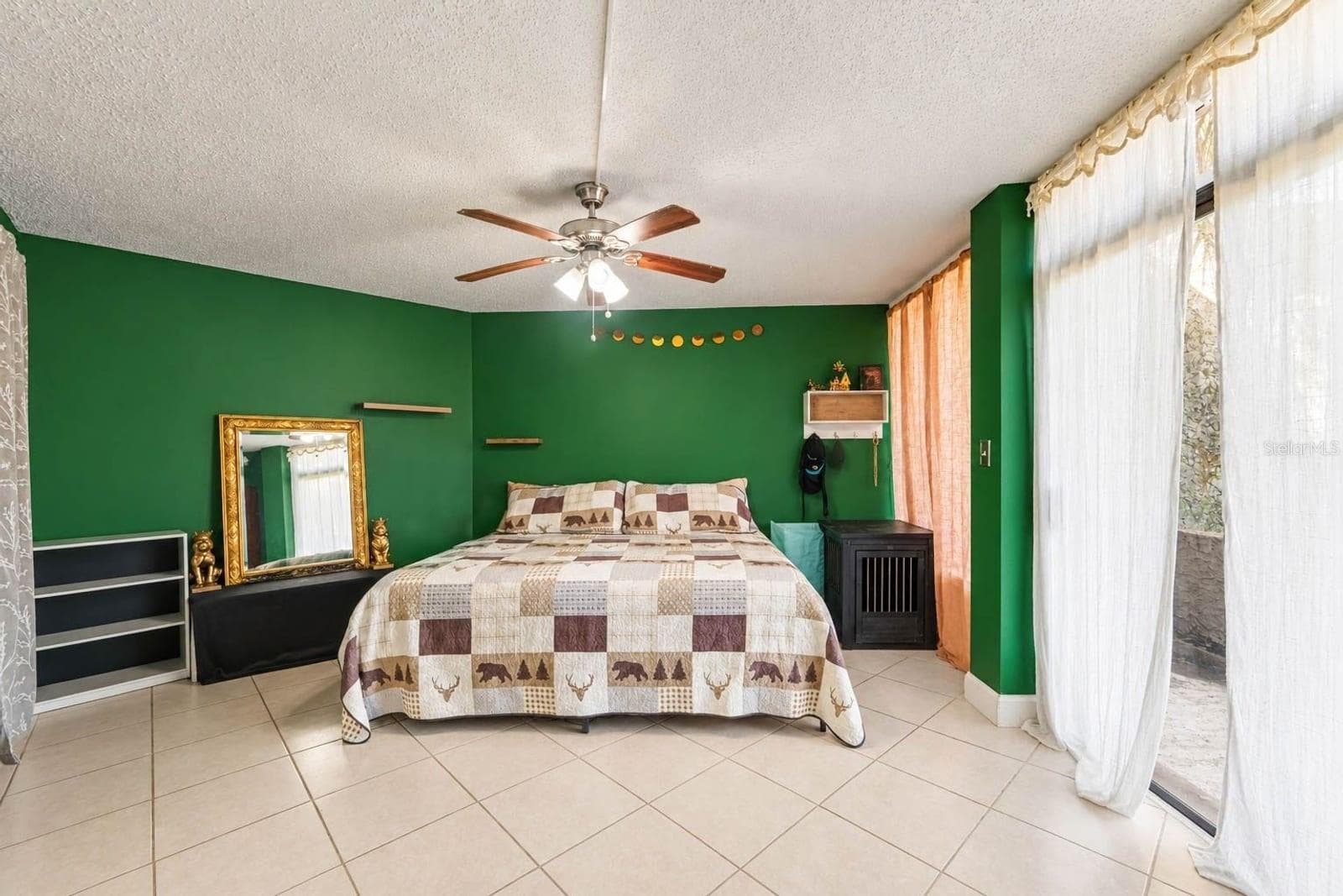 Master Suite with Green Accent Walls, Gold-Framed Mirror & Abundant Natural Light - 1055 ENCOURTE GREEN, APOPKA