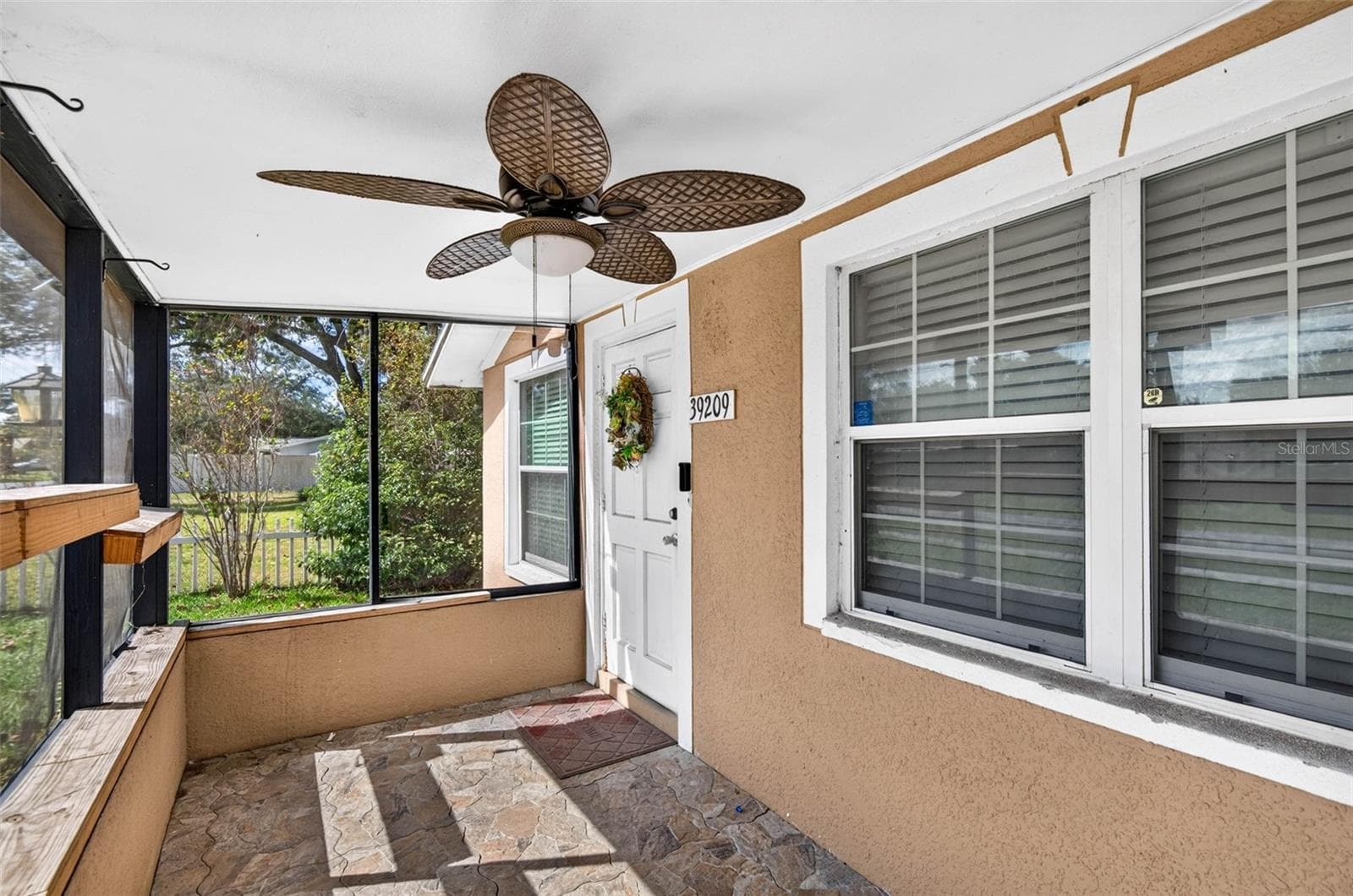FRONT SCREEN PORCH - 39209 6TH AVE, ZEPHYRHILLS
