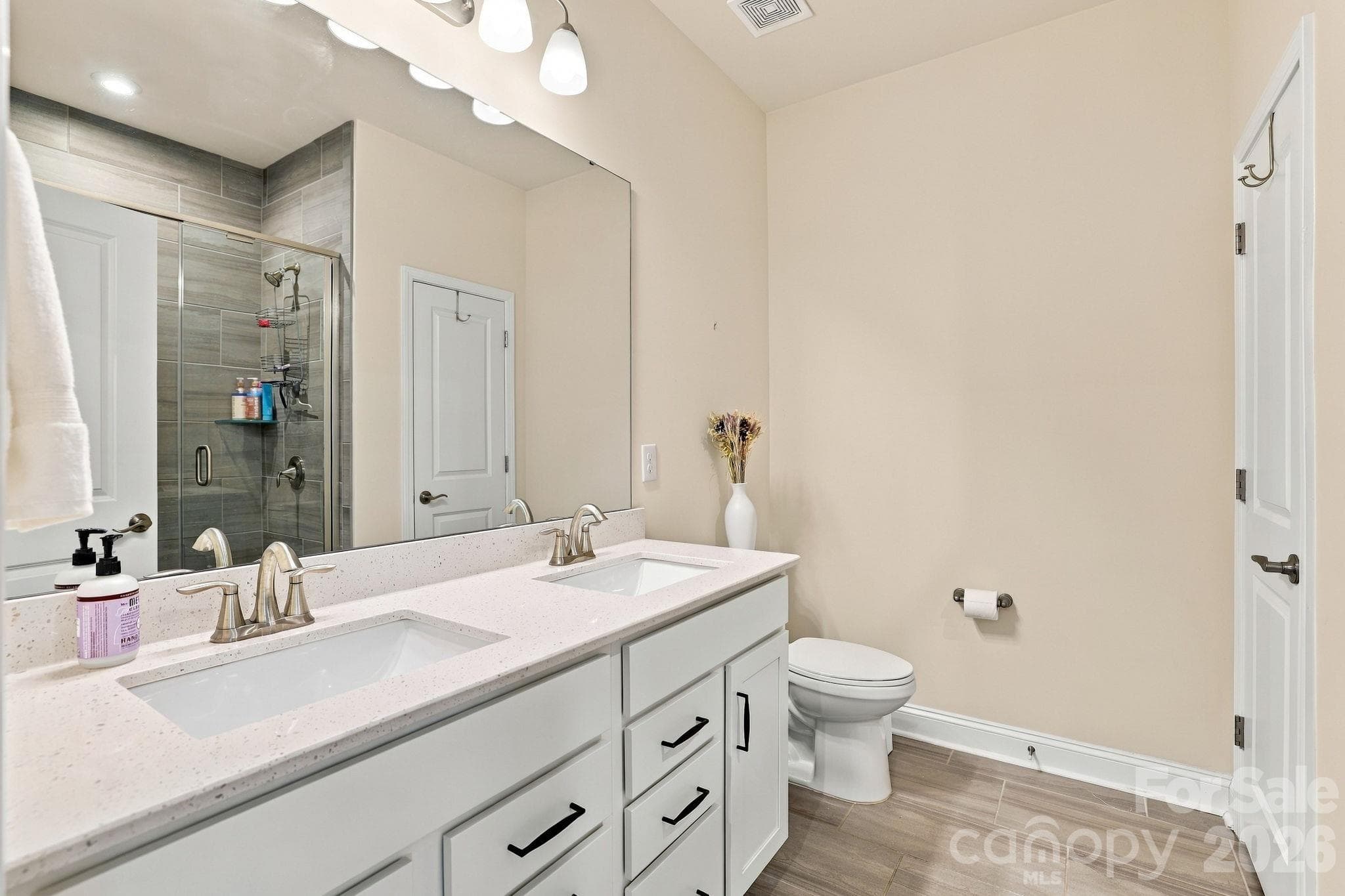 Primary bathroom with double sinks - 19201 Yellow Birch Drive, Charlotte