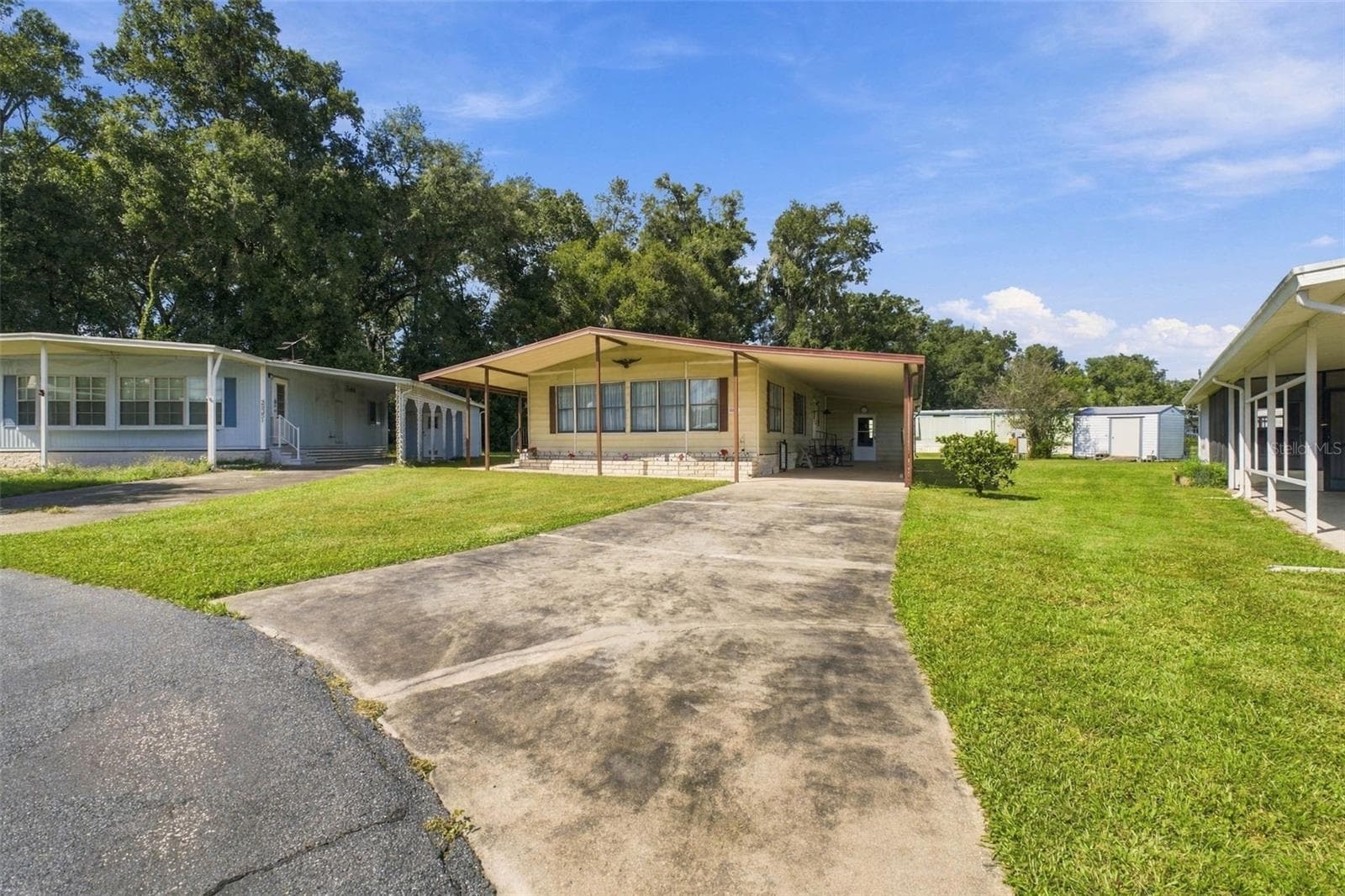 Manufactured Home at 39353 SYCAMORE LN, ZEPHYRHILLS, photo 2 of 32