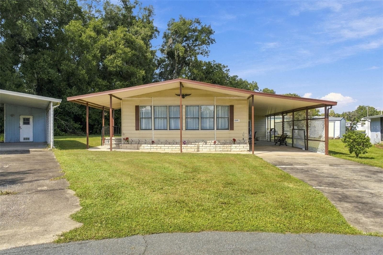 Manufactured Home at 39353 SYCAMORE LN, ZEPHYRHILLS, photo 3 of 32