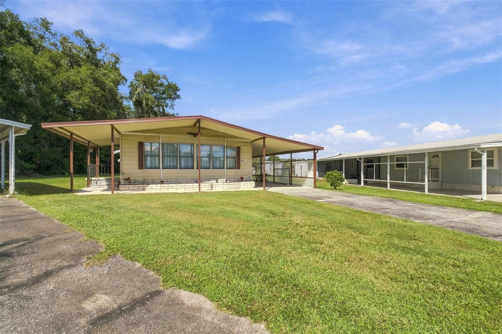 Manufactured Home at 39353 SYCAMORE LN, ZEPHYRHILLS, photo 4 of 32