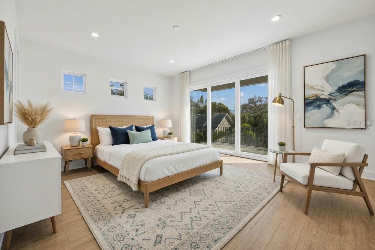 Primary suite with cascading sliders leading to patio deck (virtually staged) - 842 30TH AVE, ST PETERSBURG