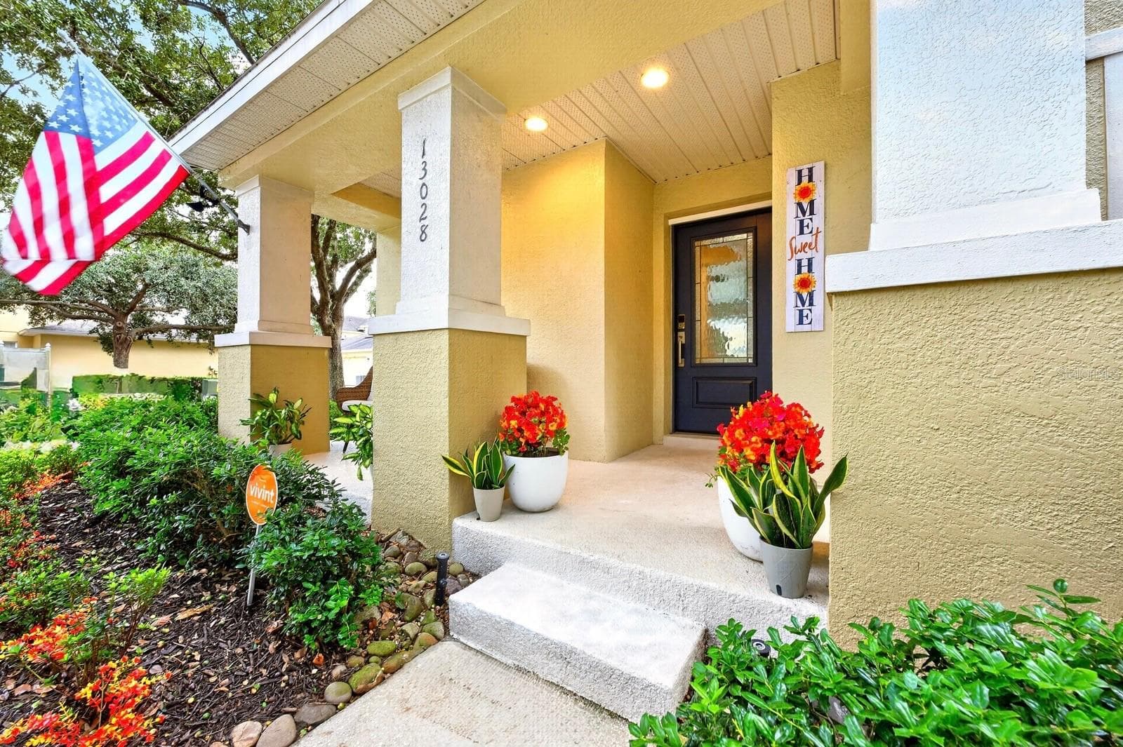 Offering over 1,800 SQUARE FEET and a charming COVERED FRONT PORCH, this home blends contemporary style with thoughtful details. - 13028 AUBURN COVE LN, ORLANDO