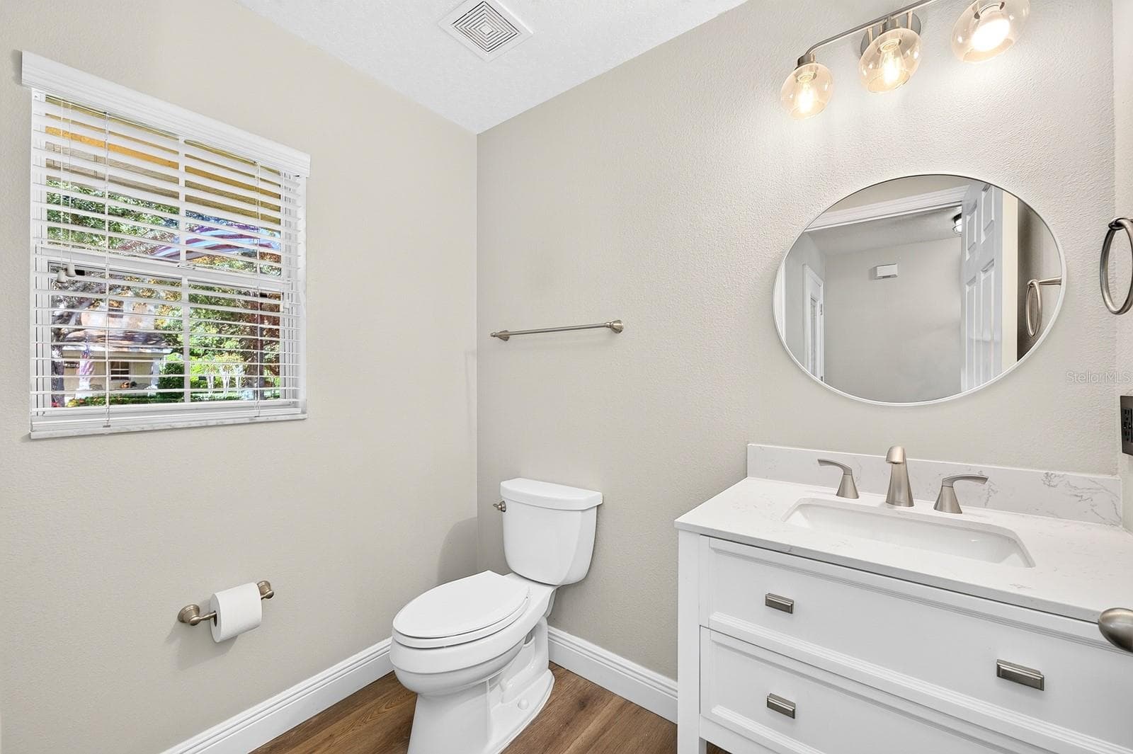 An adjacent FIRST-FLOOR FULL BATH, featuring a WALK-IN SHOWER, makes this layout especially accommodating for guests or multigenerational living. - 13028 AUBURN COVE LN, ORLANDO