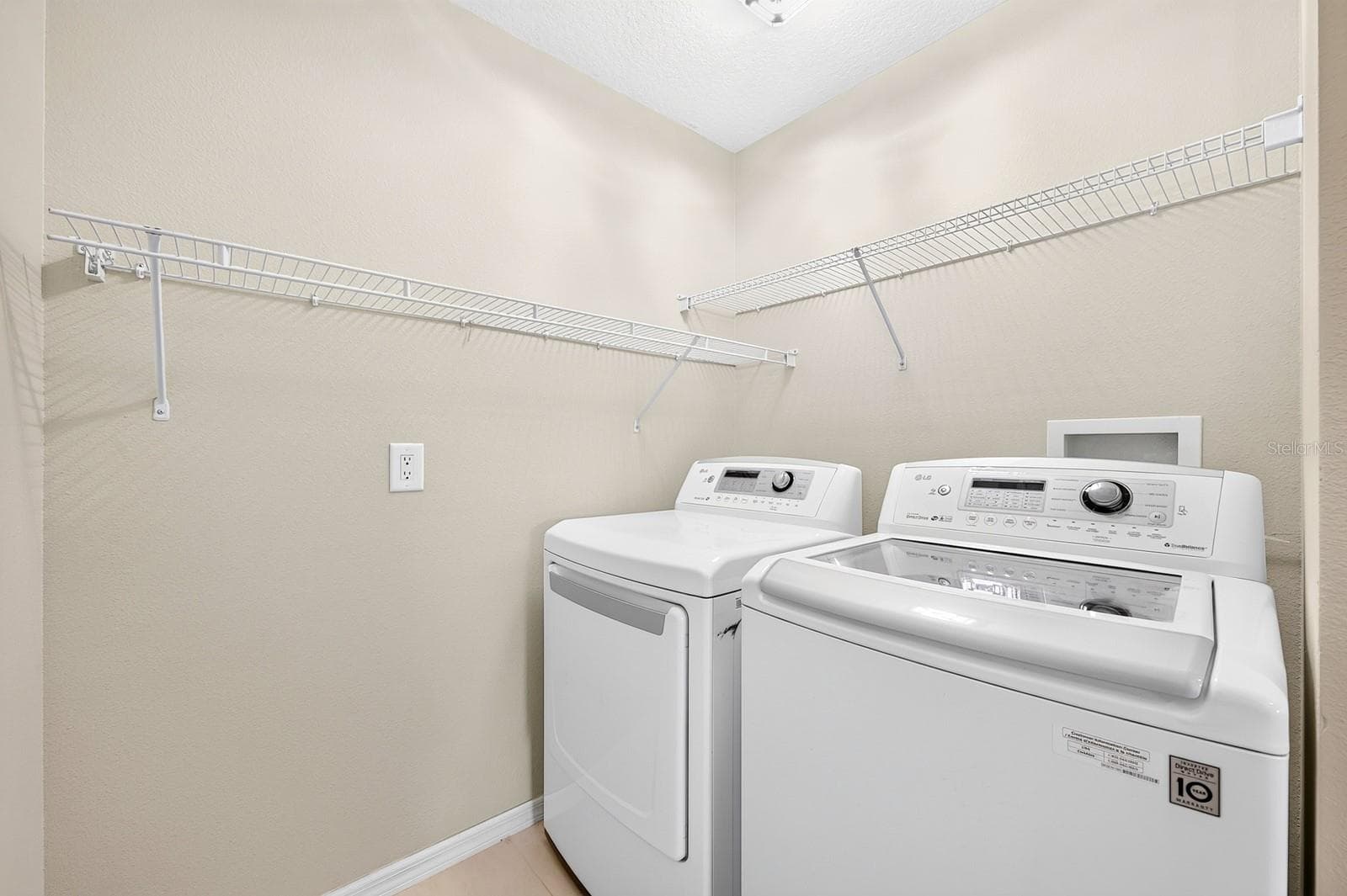 An upstairs Laundry Room is equipped with an included washer and dryer. - 13028 AUBURN COVE LN, ORLANDO