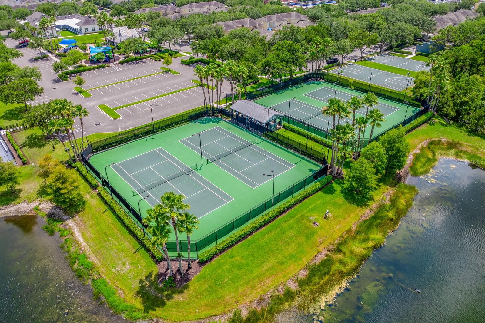 Aerial view of the tennis courts - 13028 AUBURN COVE LN, ORLANDO