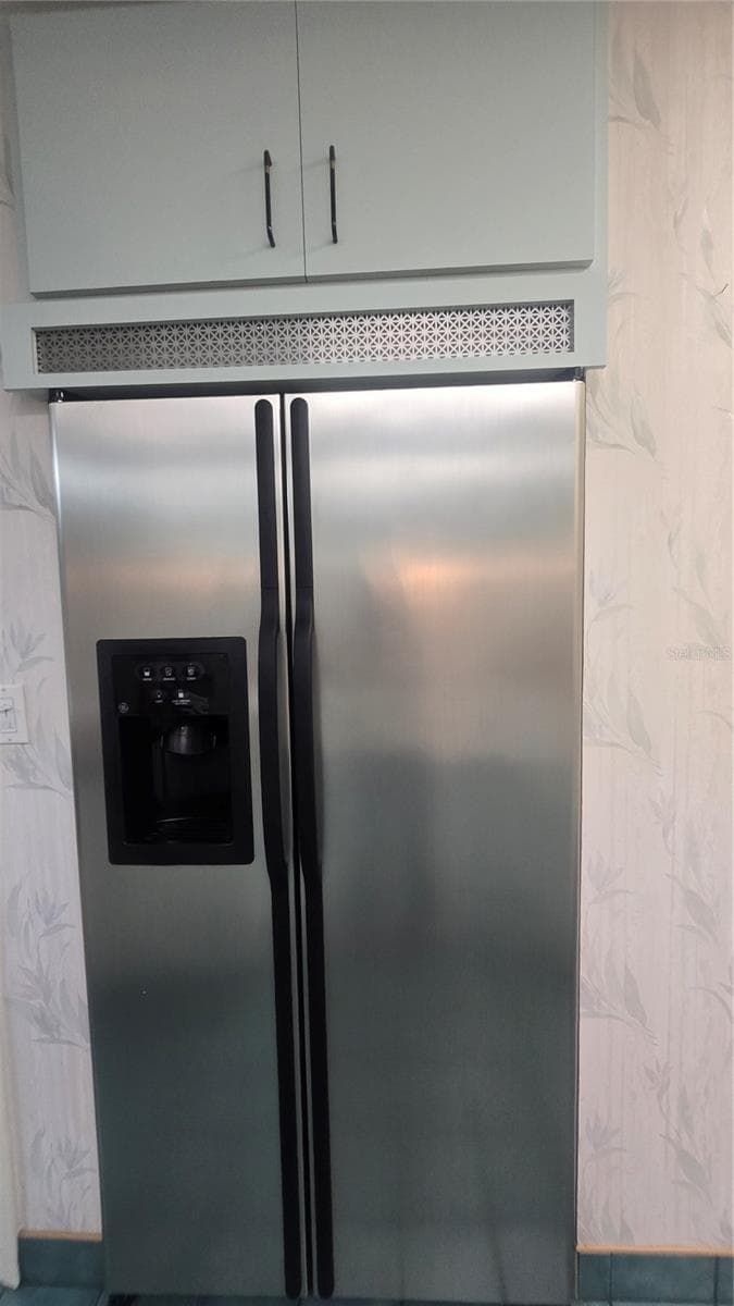 Refrigerator in kitchen (another refrigerator is in the garage) - 10386 112TH WAY N, SEMINOLE