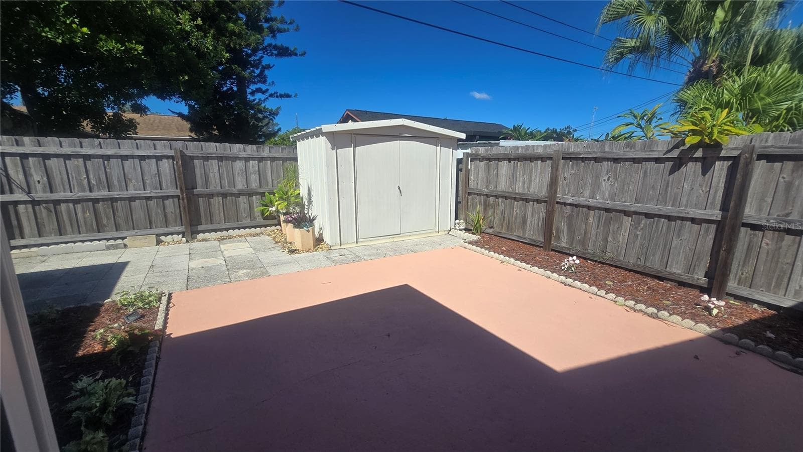 Entertainment area in the back yard and shed - 10386 112TH WAY N, SEMINOLE