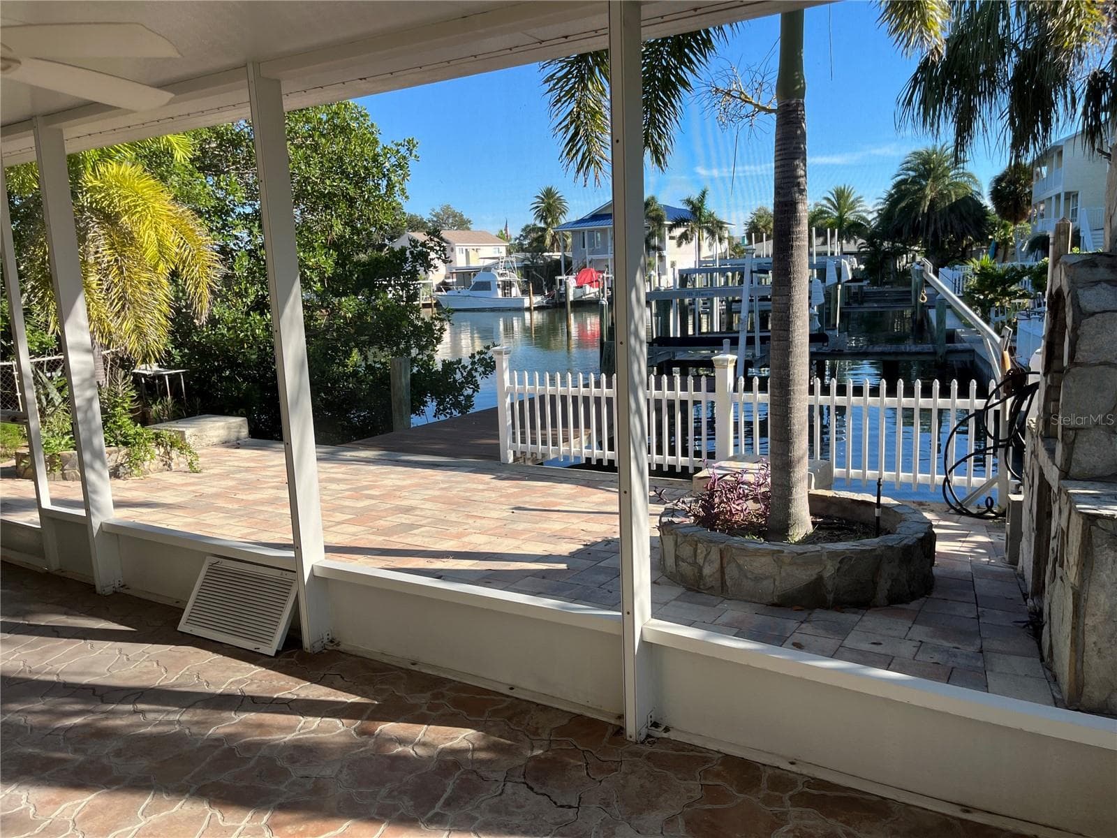 Nice covered patio for entertaining - 307 LA HACIENDA DR, INDIAN ROCKS BEACH