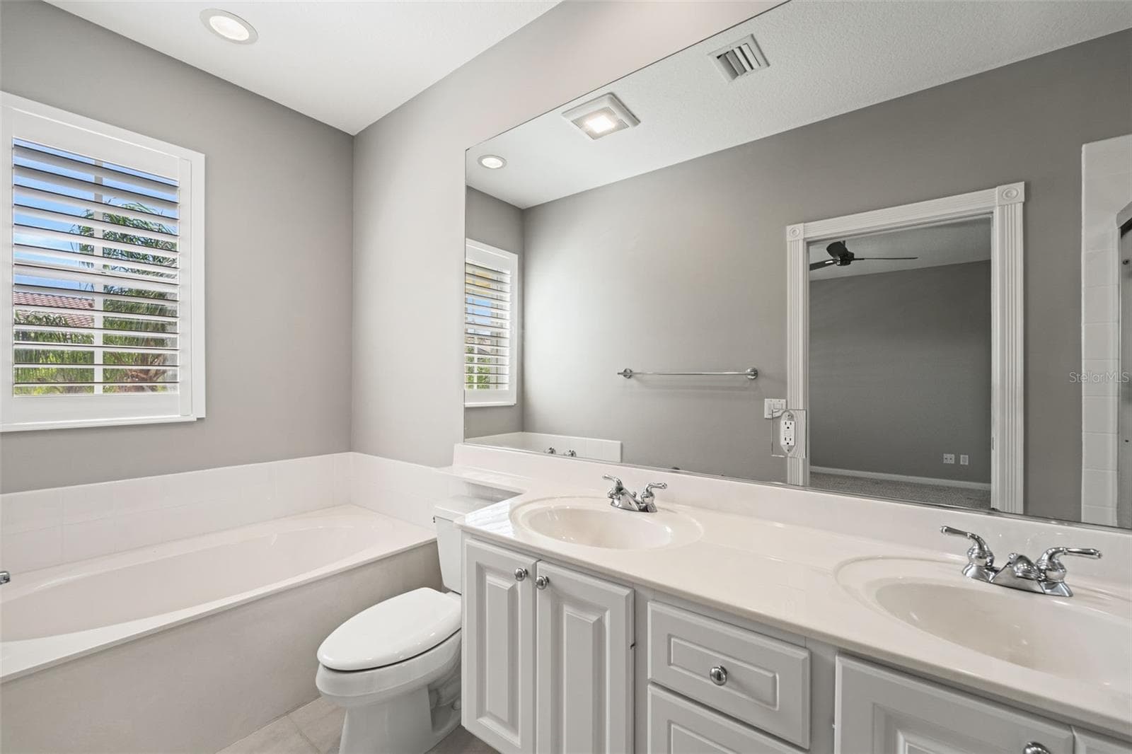 Ensuite bathroom with a tub and shower - 5389 CAMBIAGO ST, SARASOTA