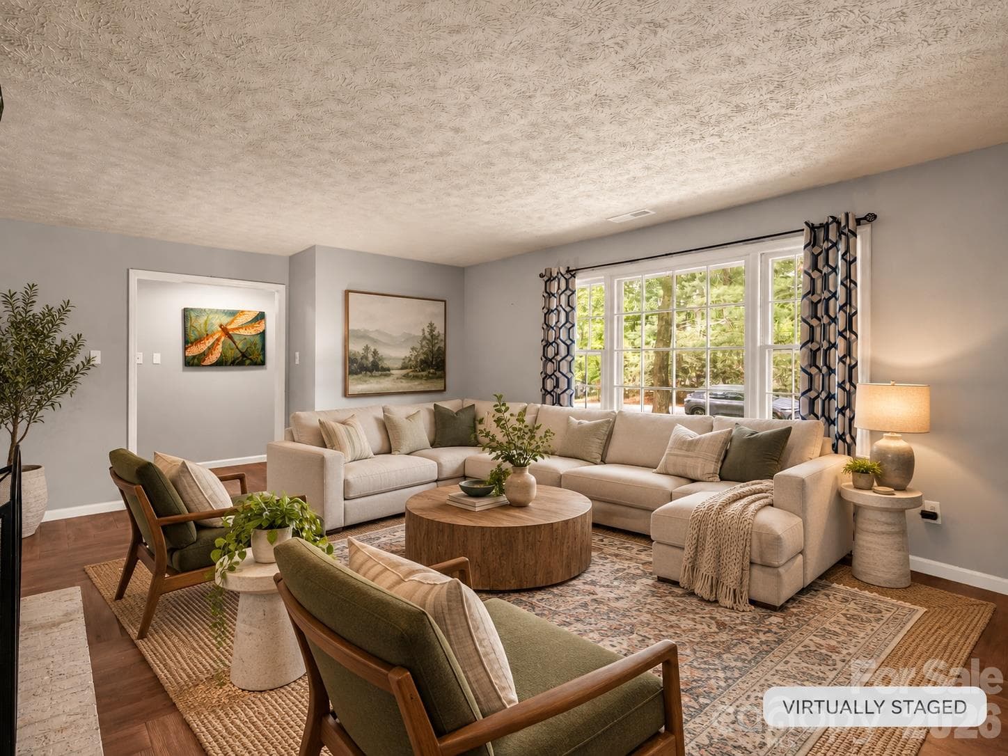 beautiful light filled living room w/ gas fireplace. items virtually removed and then virtually staged. - 92 Greenwood Acres Drive, Mills River