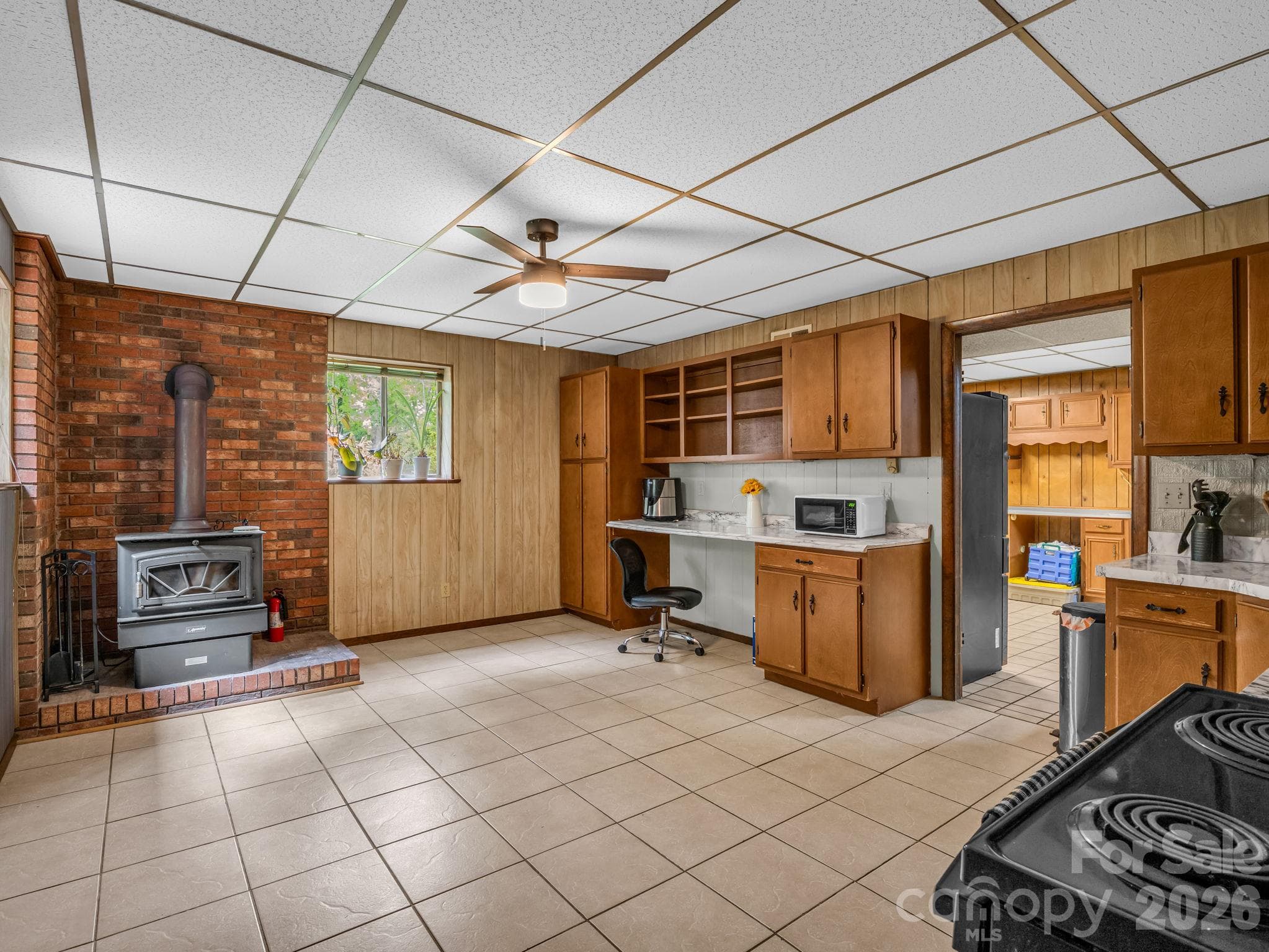 lower level full kitchen w/ a wood stove - 92 Greenwood Acres Drive, Mills River