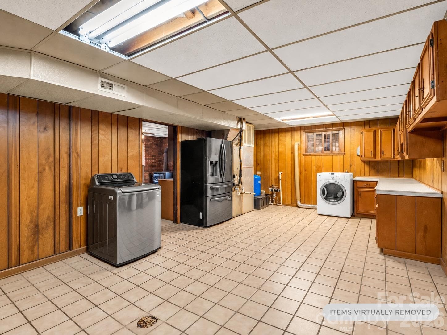 huge laundry & storage area in basement - 92 Greenwood Acres Drive, Mills River