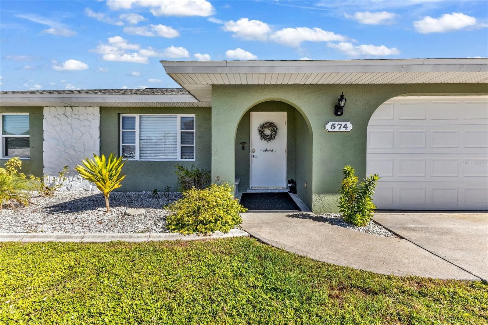 Single Family Residence at 574 AZALEA AVE NW, PORT CHARLOTTE, photo 2 of 50