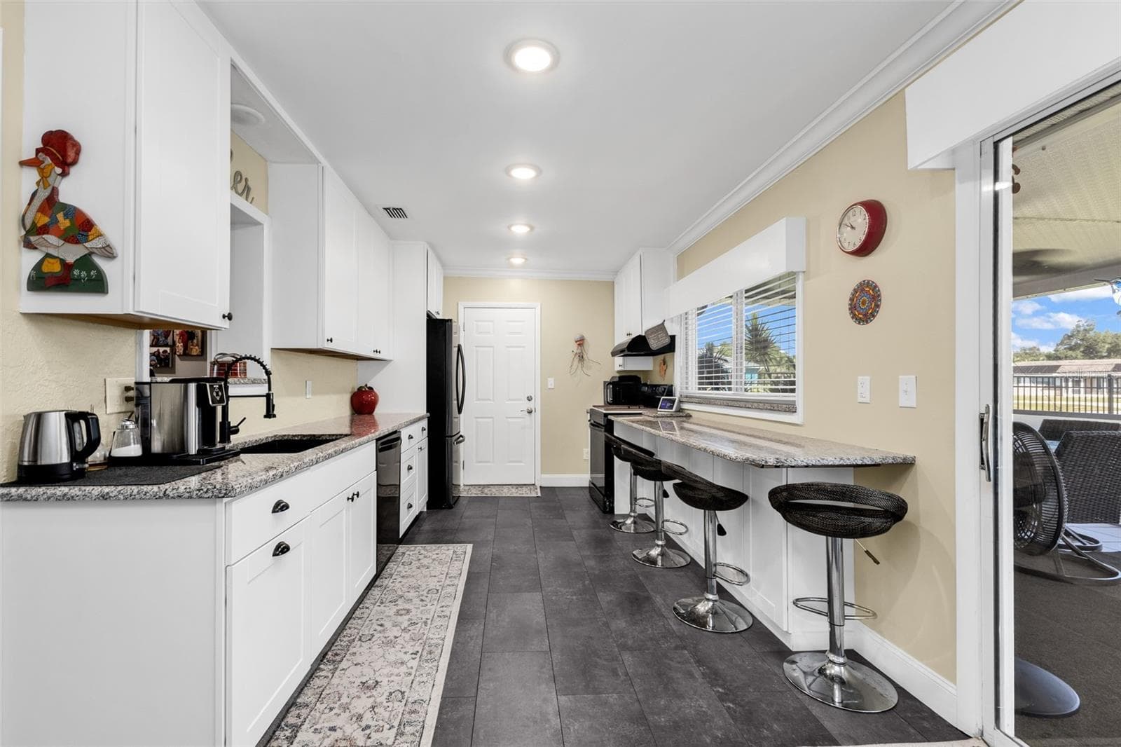 Single Family Residence at 574 AZALEA AVE NW, PORT CHARLOTTE, photo 5 of 50