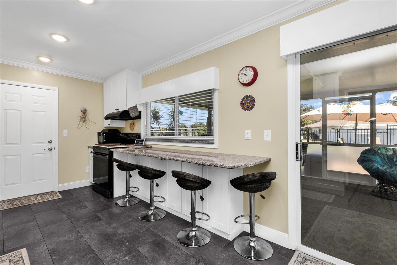 Single Family Residence at 574 AZALEA AVE NW, PORT CHARLOTTE, photo 6 of 50