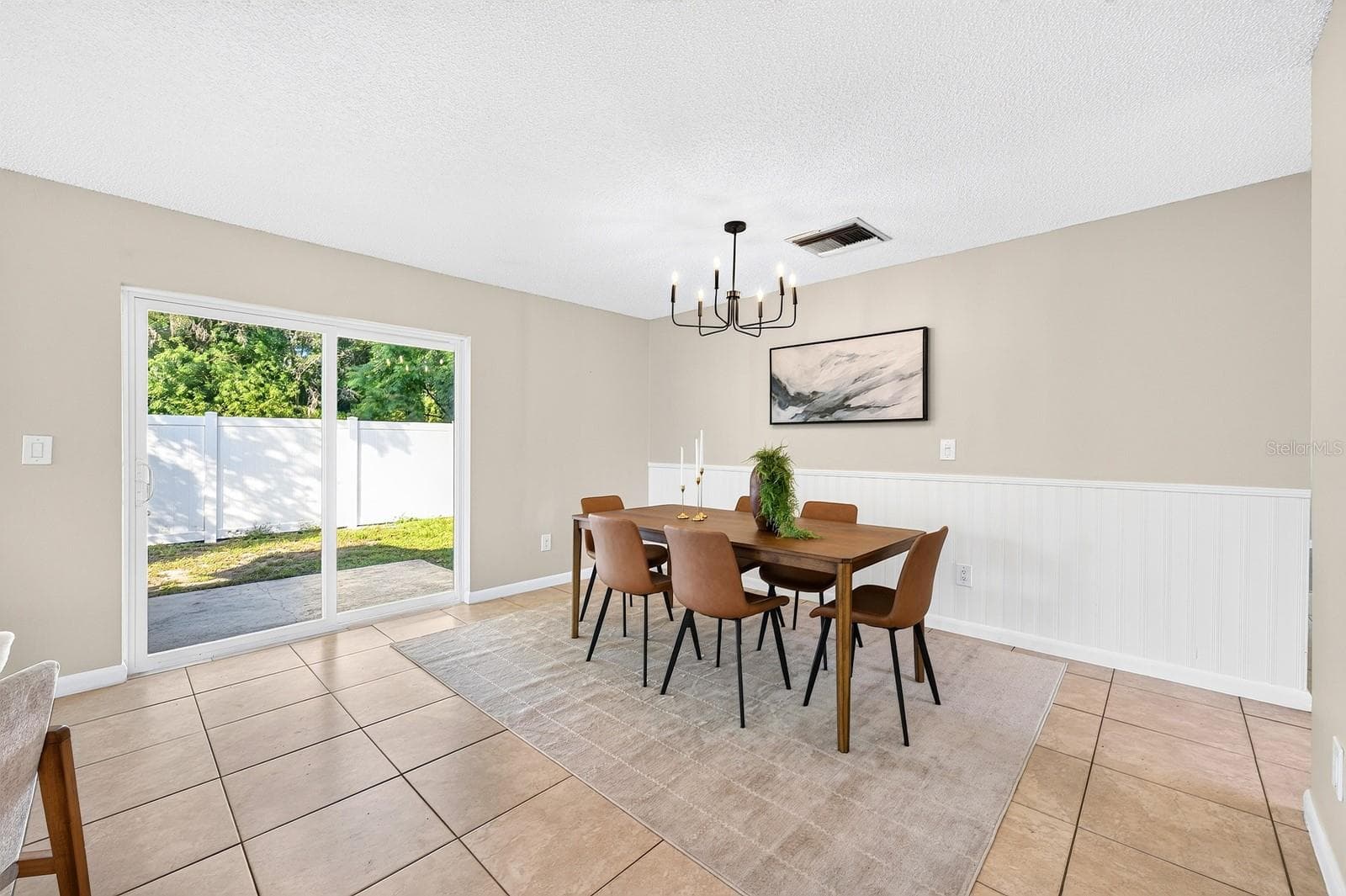 The Dining Room opens up effortlessly to the spacious flat back yard where entertainment opportunities are endless! - 543 HIBISCUS WAY #9C, ORLANDO