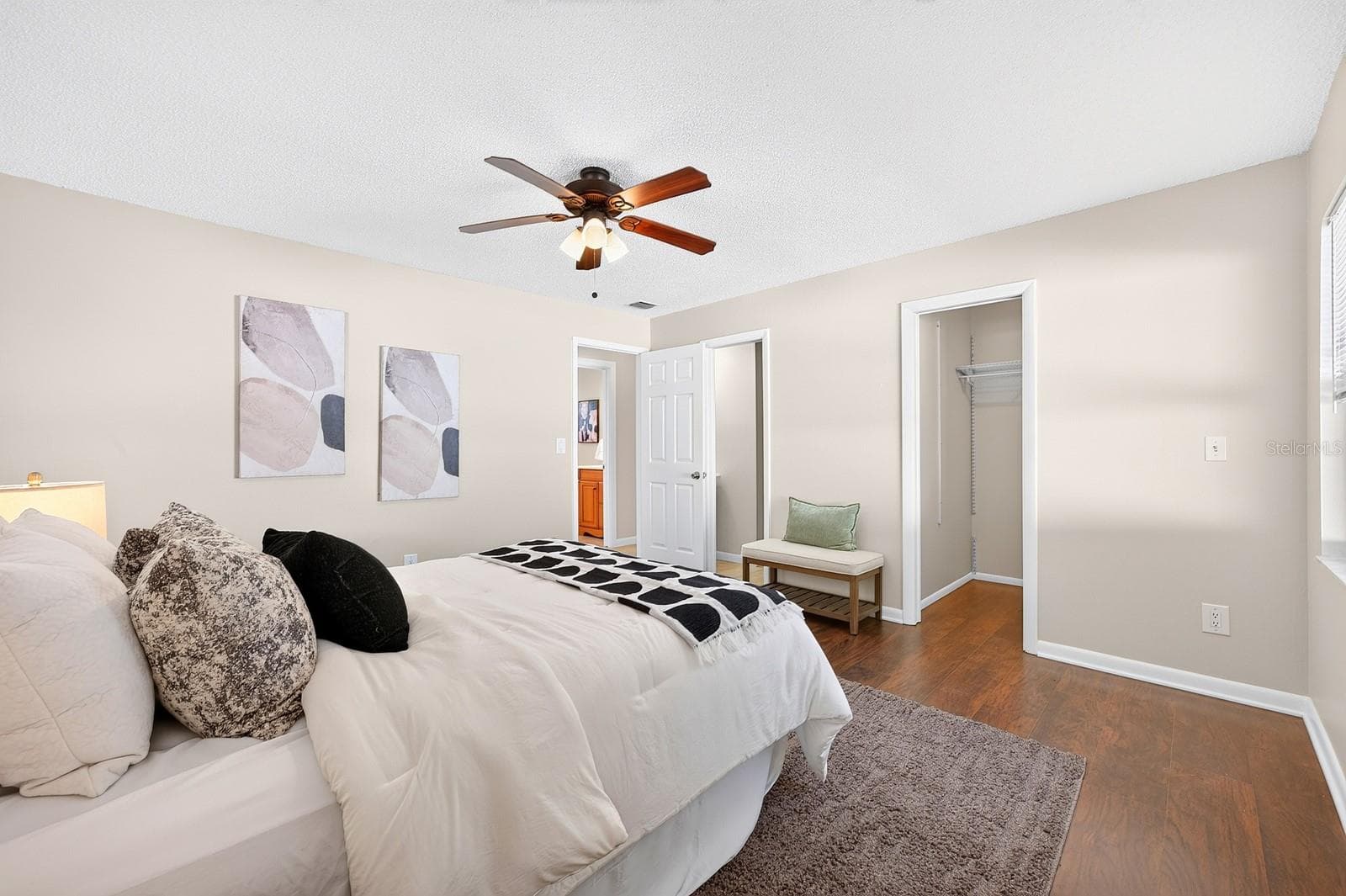 Designed for relaxation, the Primary Suite provides ample space. - 543 HIBISCUS WAY #9C, ORLANDO