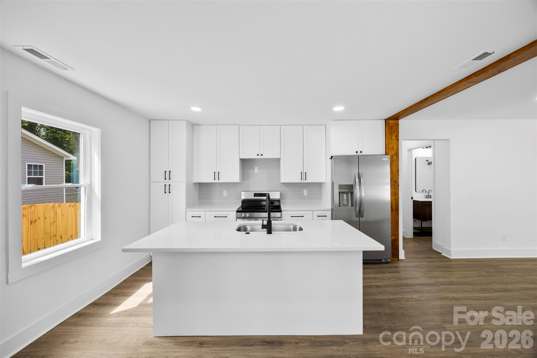 Updated kitchen with stainless steel appliances. - 2942 Reid Avenue, Charlotte