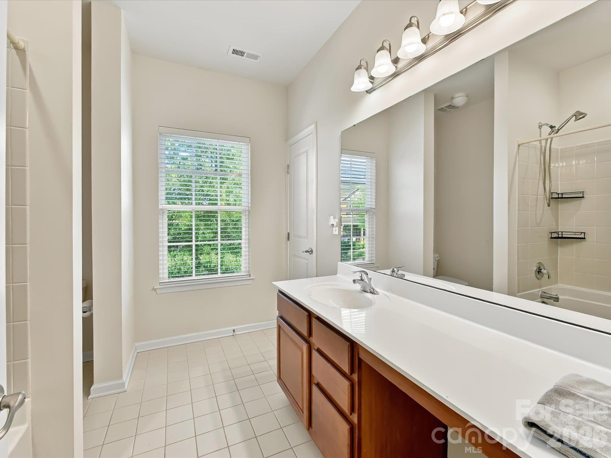 Single Family Residence at 11606 Warfield Avenue, Huntersville, photo 32 of 48