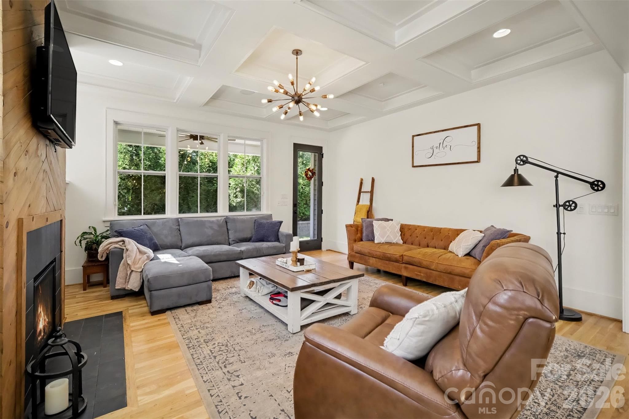 Living room with lots of windows and built-ins - 206 June Bug Lane, Fort Mill