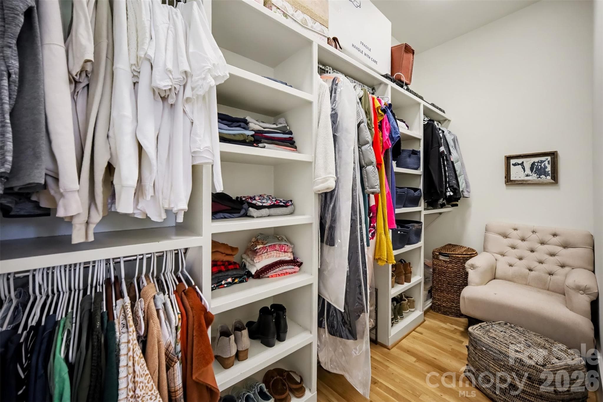 Two primary walk-in closets with custom built-ins - 206 June Bug Lane, Fort Mill