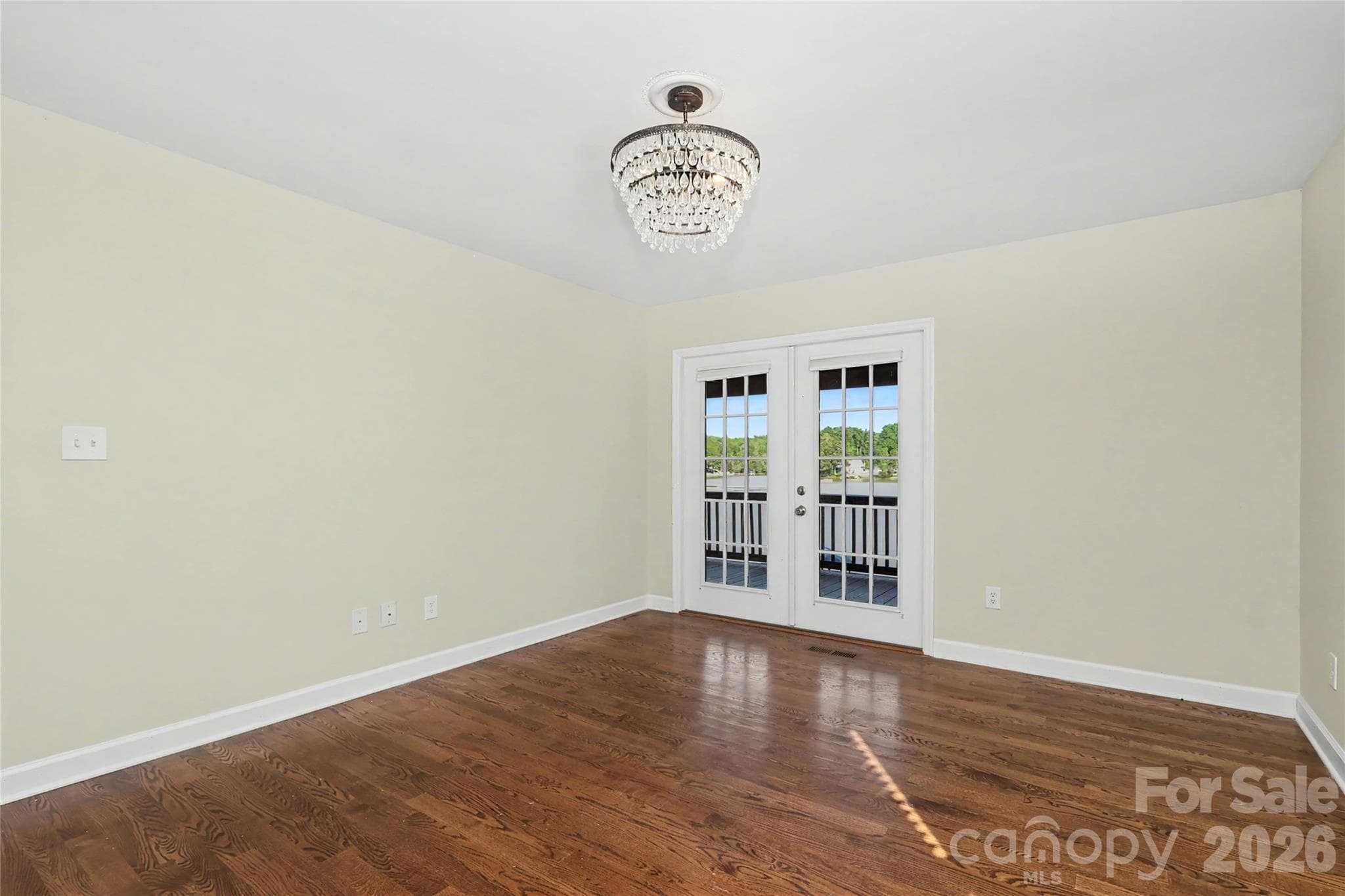 Primary Bedroom with French Doors - 3121 Lakeside Circle, Belmont
