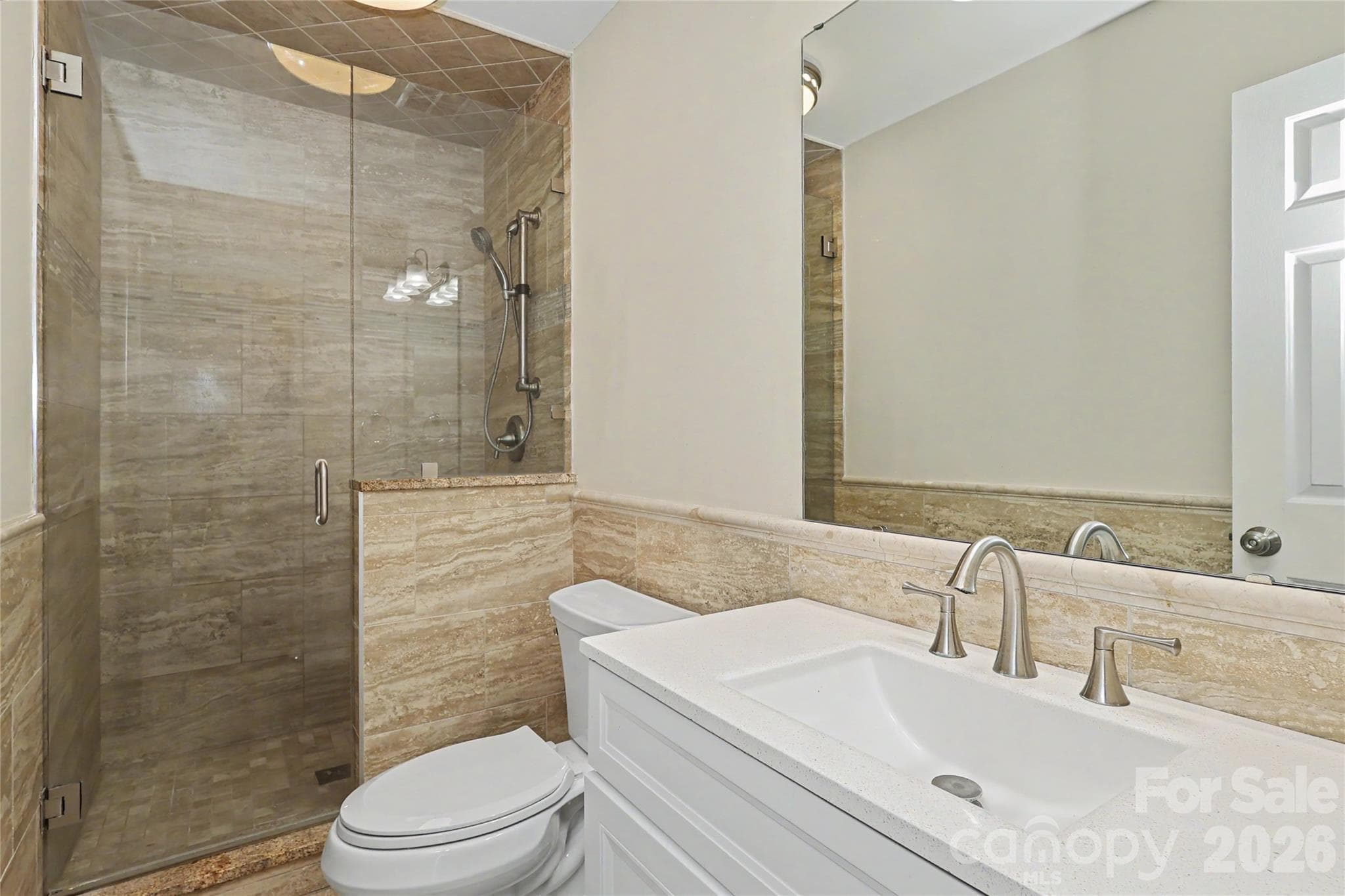 Primary Bath with jetted tub, sink and tiled shower - 3121 Lakeside Circle, Belmont