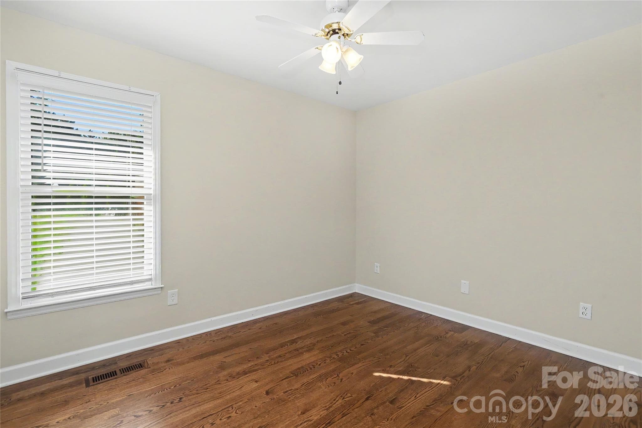 Bedroom 2 with large closet and hardwoods - 3121 Lakeside Circle, Belmont