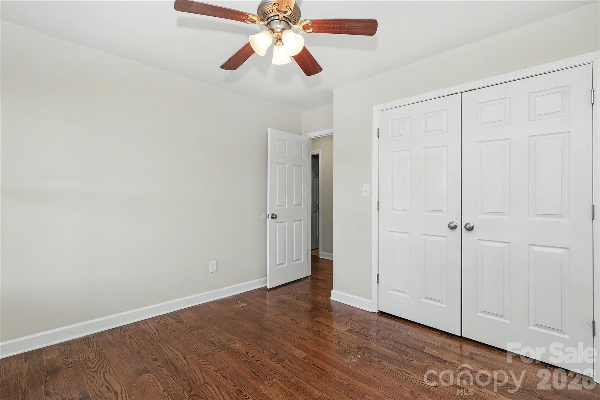 Bedroom 3 with large closet and hardwoods - 3121 Lakeside Circle, Belmont