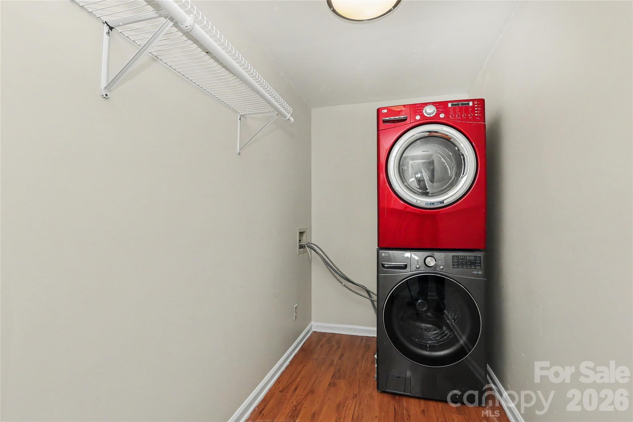 Lower Level - Laundry Room with hanging bar.  Washer and Dryer included - 3121 Lakeside Circle, Belmont