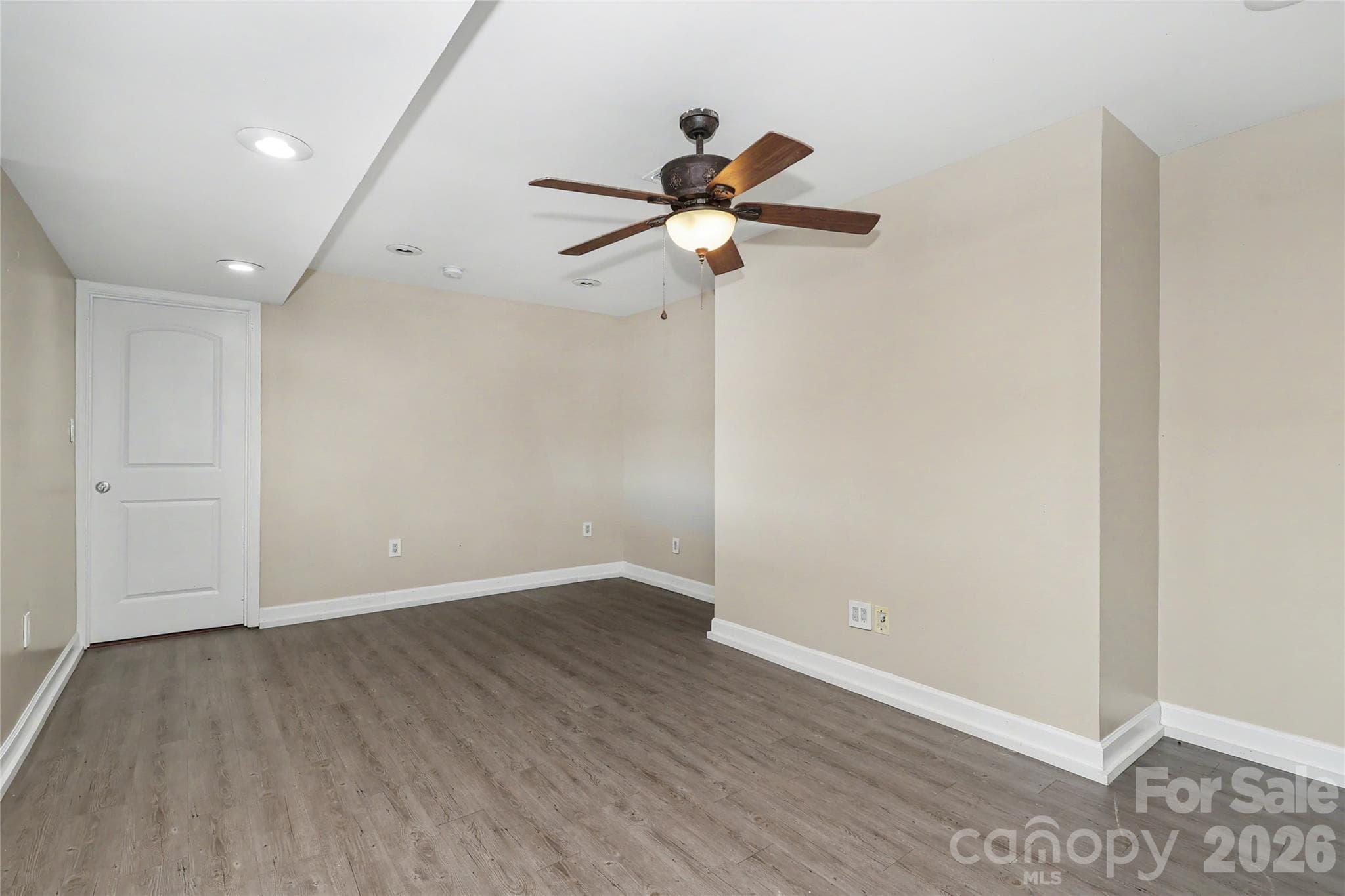Lower Level Family Room with ceiling fan - 3121 Lakeside Circle, Belmont