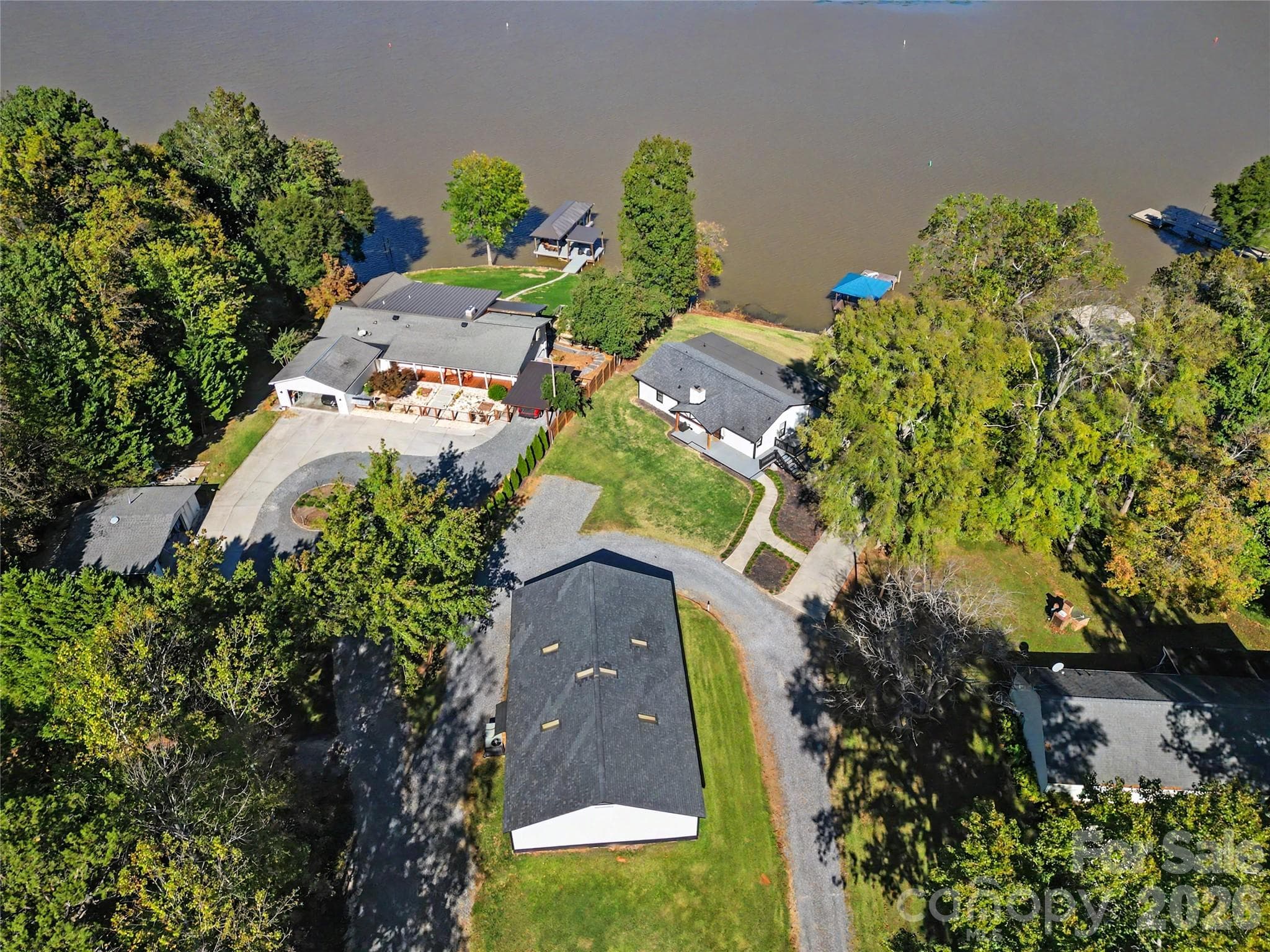 Aerial view of the home and building in front - 3121 Lakeside Circle, Belmont