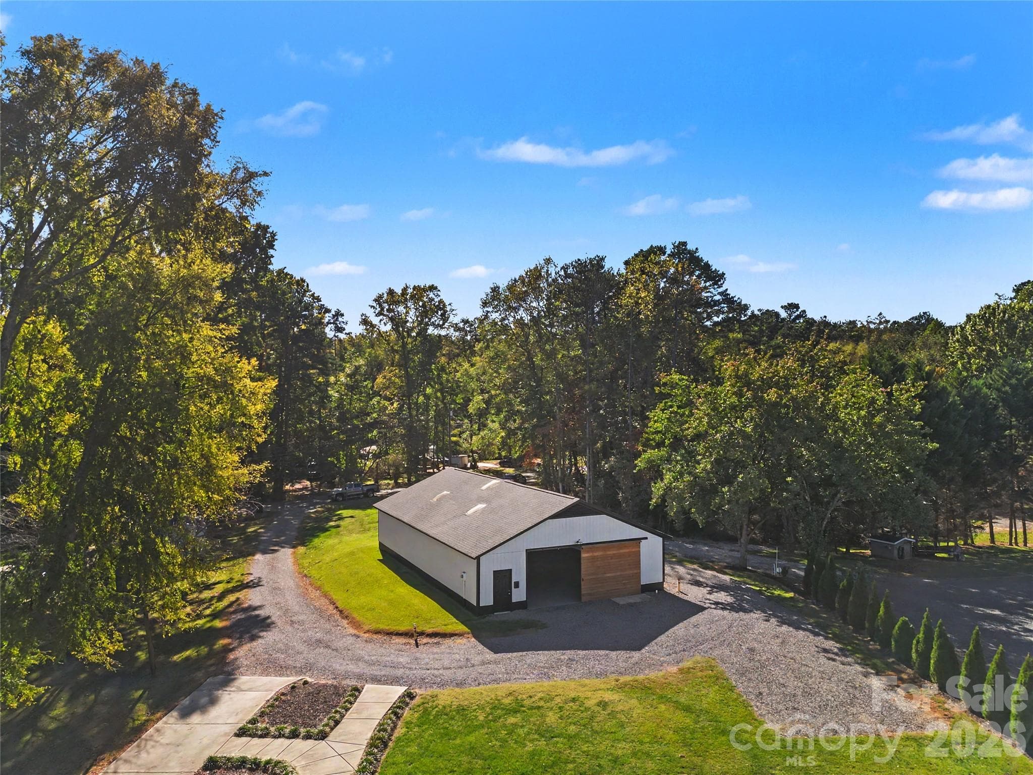 Aerial View of the large building in front of property.  Approximately 2100 SF - 3121 Lakeside Circle, Belmont