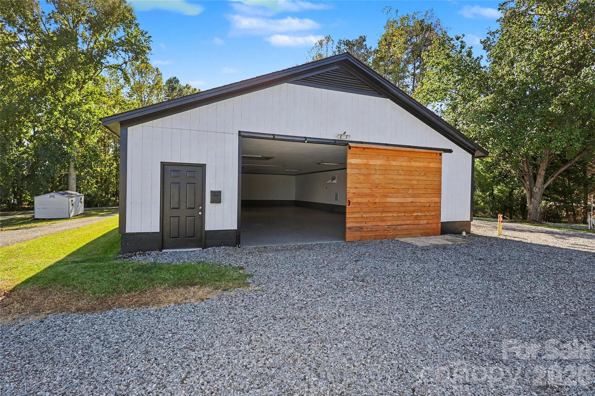 Large building in front of property.  Approximately 2100 SF - 3121 Lakeside Circle, Belmont
