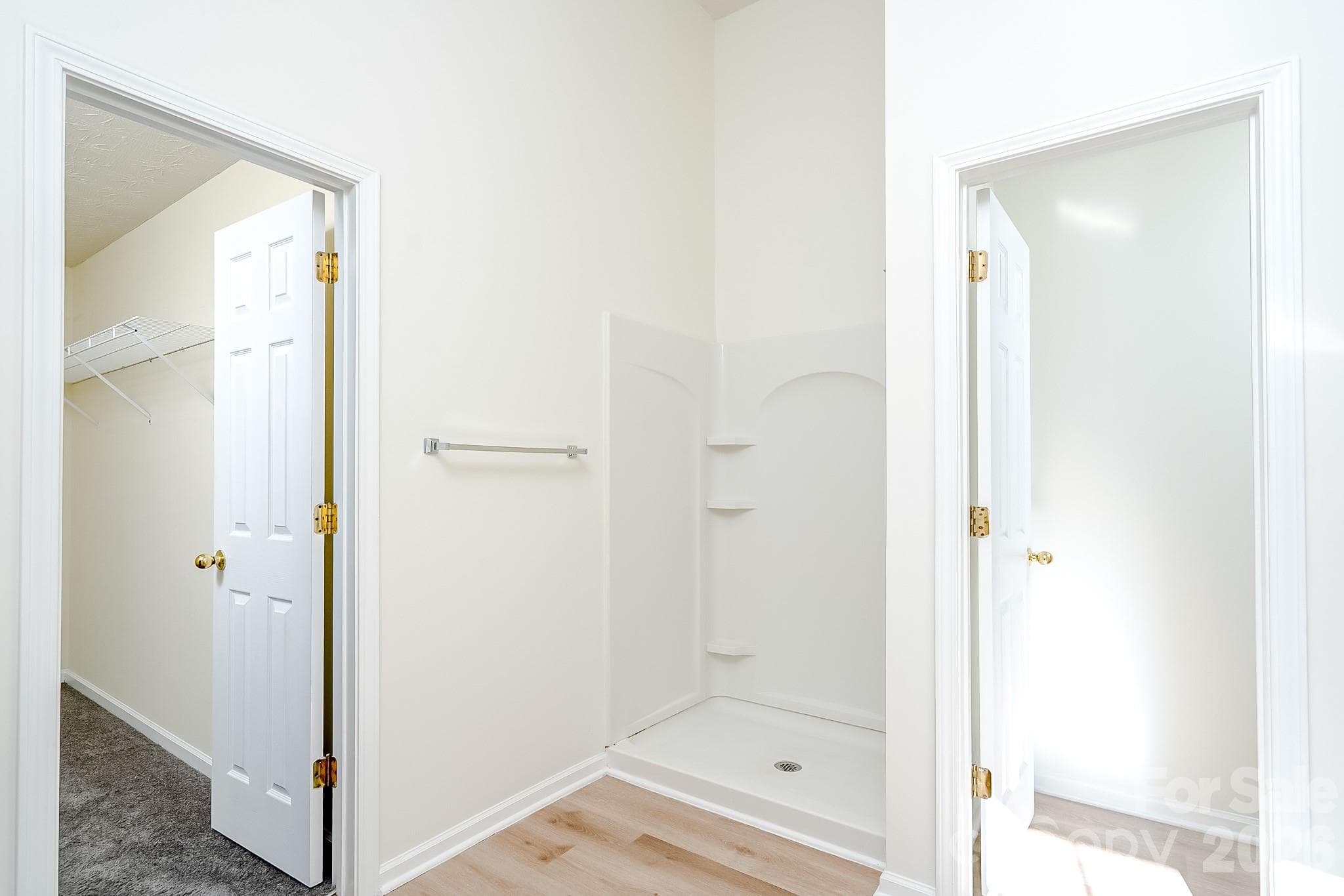 Primary bathroom with garden tub and separate shower - 5124 Eagle Creek Drive, Charlotte