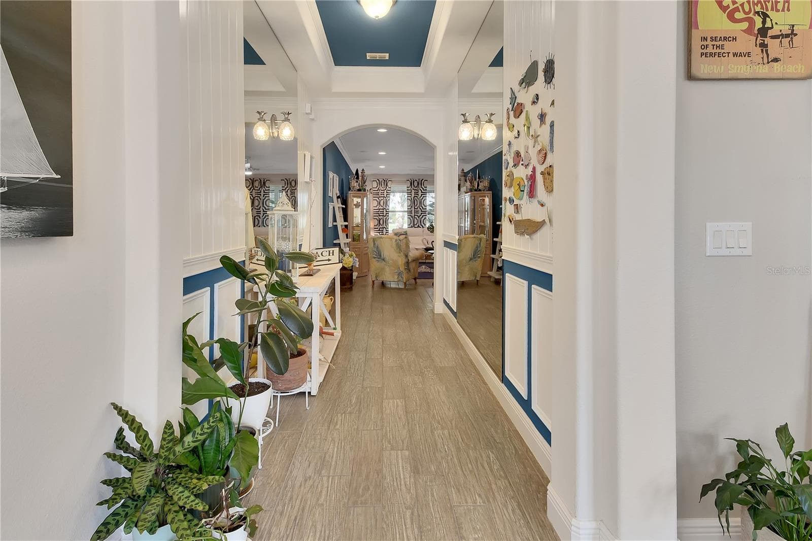 Coastal foyer with wainscotting - 126 MYRTLEBERRY LN, DELAND