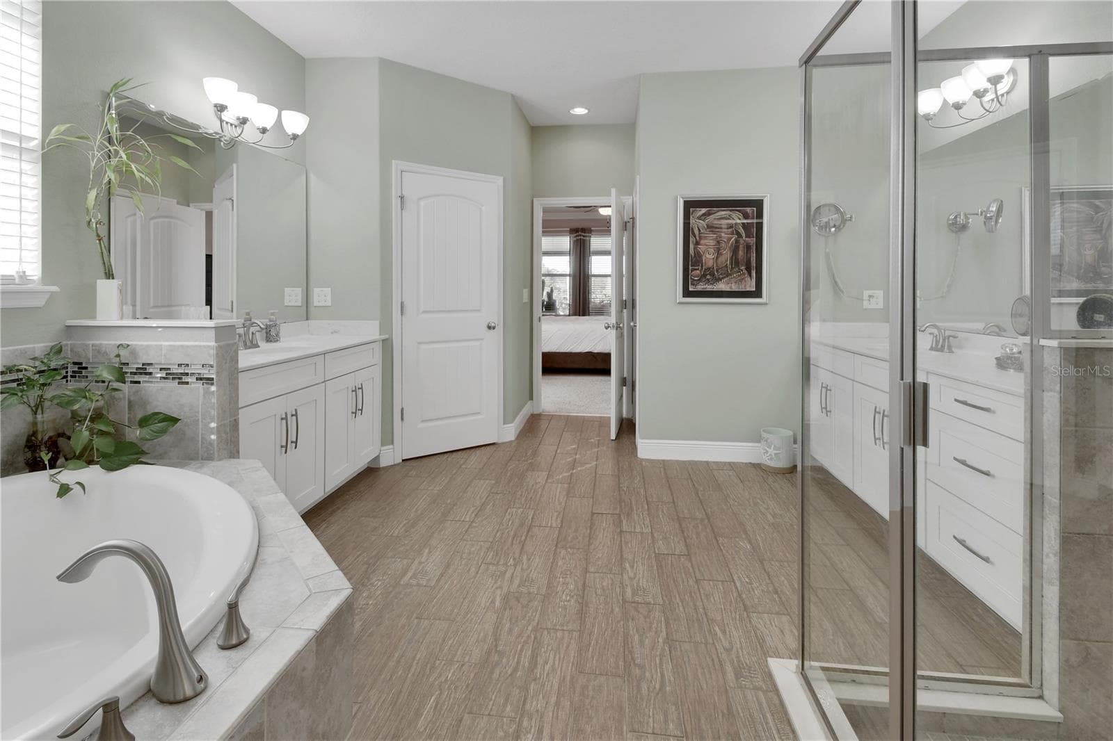 Privacy Lavatory and linen closet behind entrance door - 126 MYRTLEBERRY LN, DELAND