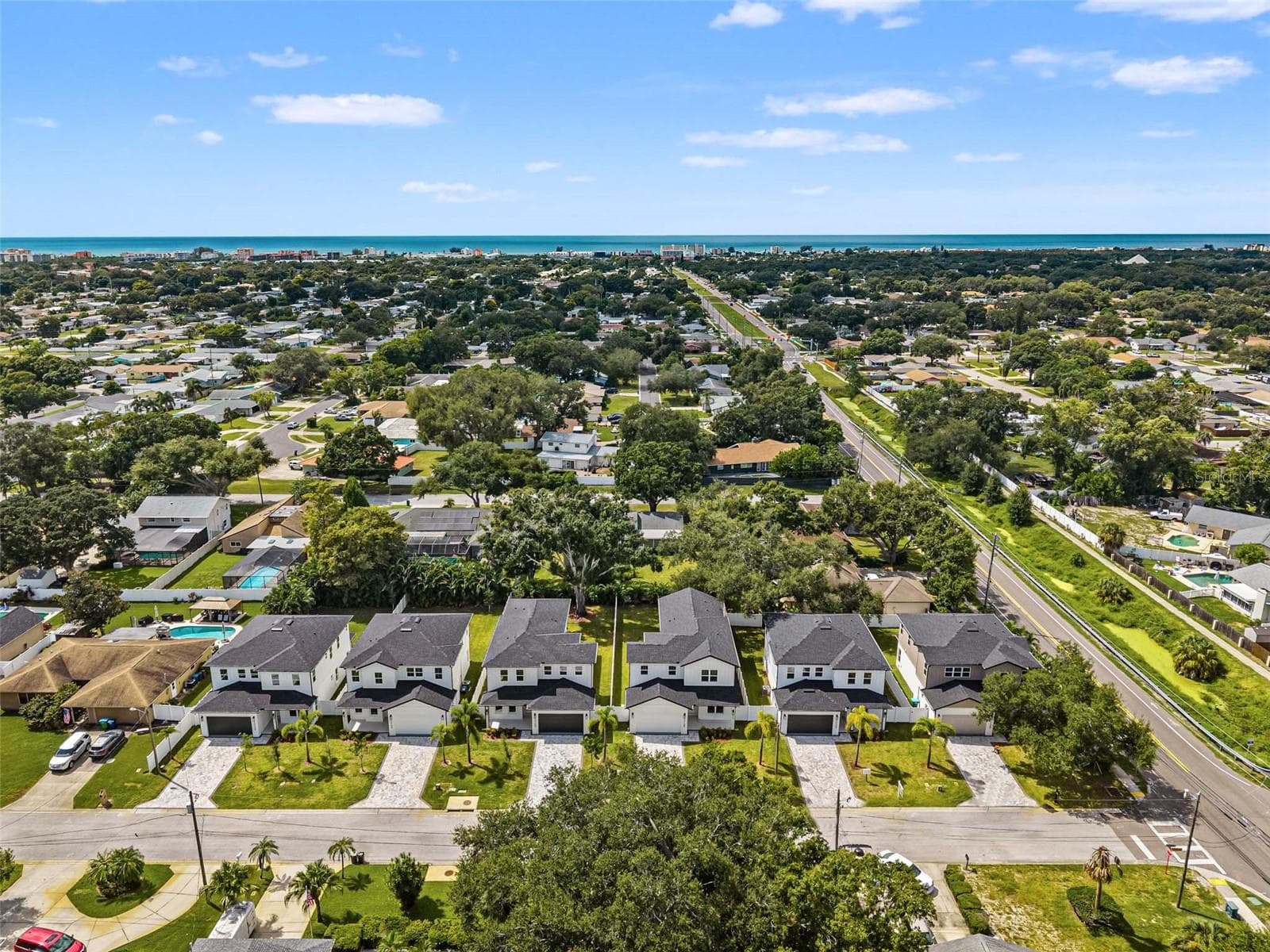 aerial view of all homes with the beach in the distance - 10144 HODSON PL, SEMINOLE