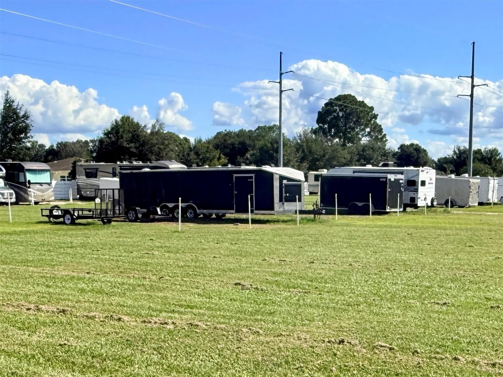 Storage for RV's And Boats included when you live here. - 911 GRAND VISTA TRL, LEESBURG