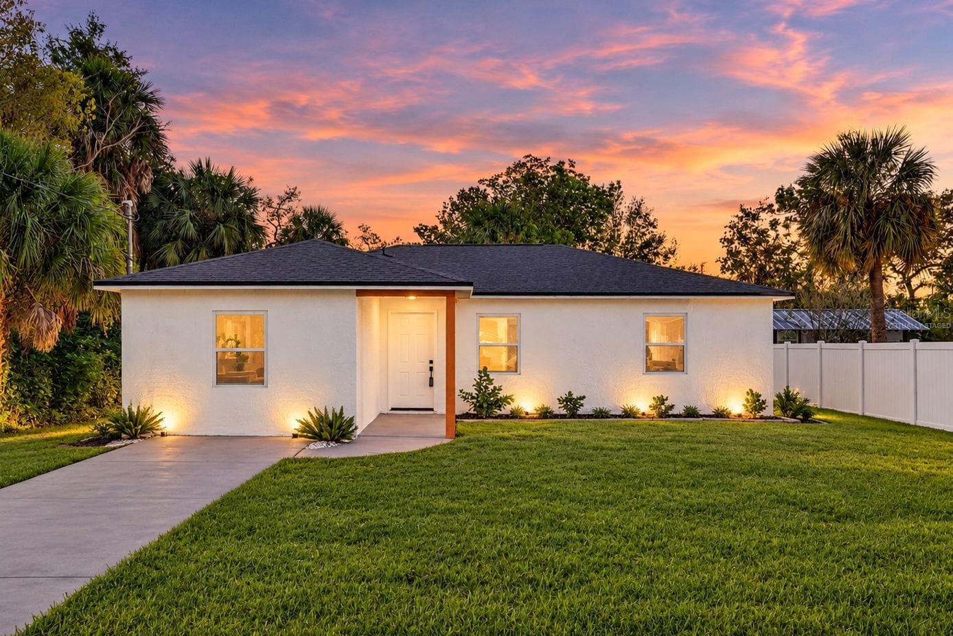 Virtually Staged exterior night view - 16107 SEA PINES DR, HUDSON